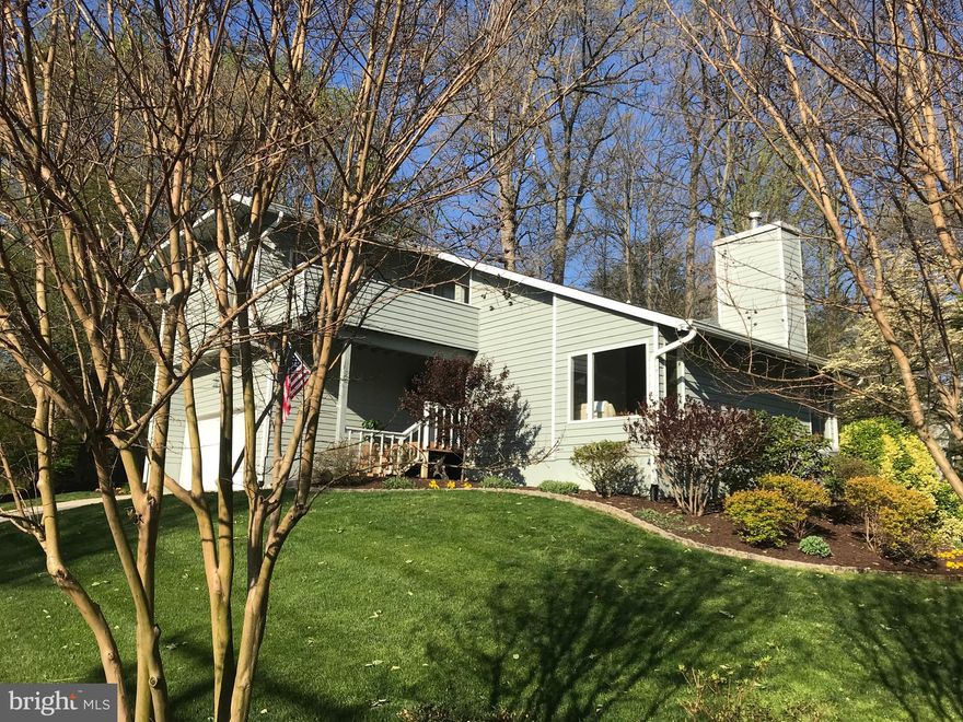 Wow! A $76,000 Price Reduction!   Easy to Show---Just One Person Living Here!   LOVE Living in Ulmstead Estates with 2 Marinas, Community Pool, Tennis, Volleyball/Basketball, Waterfront Playground and a Year of Social Activities for Everyone.    Your beautiful  4 BR, 2.5 BA, 3146 Finished SF contemporary home with cathedral ceilings, oversized abundant windows, hardwood flooring throughout and wonderful open living spaces on a private .37 acre lot in Ulmstead Estates.  Living room is open to dining room with double sided gas fireplace in between.  Entertain in your renovated kitchen with large center island , gas cooking and stainless steel appliances open to family room and private deck---perfect for entertaining!  Upper level has master bedroom with private balcony, ensuite bathroom with dual vanity and oversized shower with pretty tile and three closets.  Three additional bedrooms upstairs and another full bathroom with dual vanity and tub/shower.  Lower level rec room is great for any age while the storage room/workshop is easily accessed inside or via exterior ramp.  Private back yard is perfect for sandboxes and swing sets.   Outdoor zoned irrigation system ensures a beautiful lawn summer after summer.  Your new home is a short bike ride away from the Community Pool,  Tennis Courts,  Marinas and Waterfront Playground.  Broadneck Blue Ribbon public schools; easy commute to DC/Baltimore.   Welcome home to 646 Owl Court.