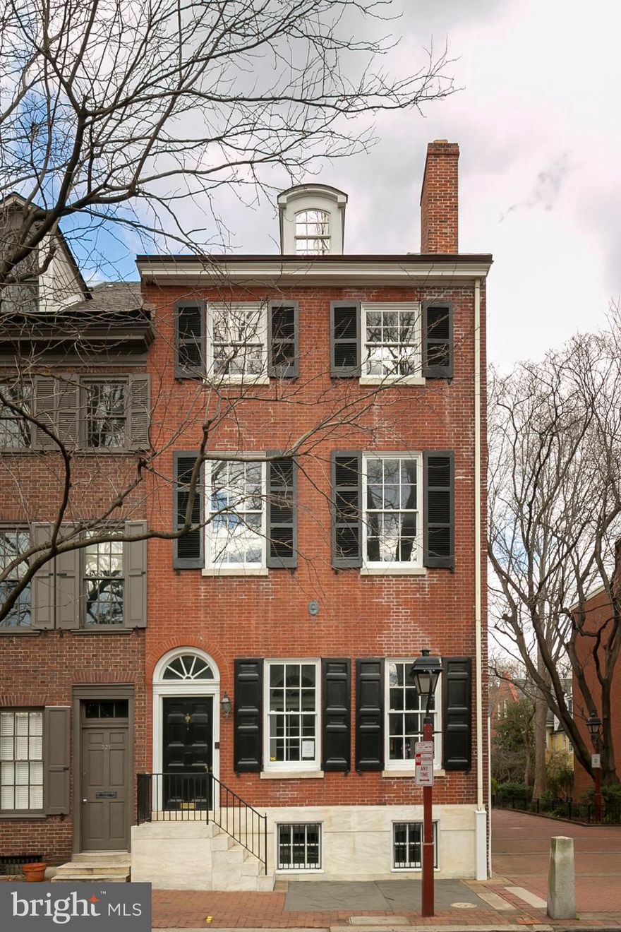 Exquisite 1827 historic corner home in Society Hill. A tranquil and unique setting on St. Peter's Way with spectacular views of St.Peter's Church and gardens in addition to views of historic home and 3 Bears Park.  This home is located on a beautiful tree-lined street with north, south and east exposures. This light-filled home is an elegant combination of old and new.  A complete renovation when purchased, there have been numerous, extensive enhancements o the property.  The home consists of 4 bedrooms and study, 5 baths and Powder Room and 5 fireplaces. Unique spacious black and white marble entry foyer, original historic details, high ceilings, original stairway and restored wood floors throughout. Large living room and dining room with fireplace. Large eat-in gourmet kitchen, Wolf stove with double oven, Cherry cabinets, granite counters, Subzero refrigerator, Asko dishwasher and microwave and pantry.  Access to 2 level brick garden with decorative fountain, through entry to St. Peter's Way leads to 3 Bears Park, French doors, surrounded by mature trees, marble PR and double coat closet. Beautiful original stairway leads to 2nd floor study overlooking lovely gardens. Master bedroom suite, with sitting room and fireplace, located on 2nd floor, with incredible light and views, faces St. Peter's church. Very large and luxurious, white marble master bath with tub and separate glass shower, double sinks and terrace. 3rd floor has 2 large bedrooms, extensive closets, 2 fireplaces and 2 full en suite marble baths. 4th floor is a large cathedral ceiling bedroom/family rrom with full bath, fireplace and deck with outstanding views of the city and Ben Franklin Bridge. Large, finished basement with high ceilings, full bath, laundry room, sauna and wine cellar.  HVAC 3 zones. Rubber and shingle roof - 2016 new.