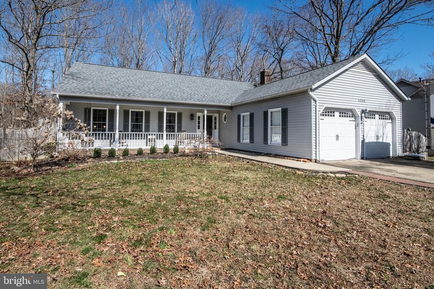 This gorgeous home offers you 1822 square feet on the main level.  3 Bedrooms, 2.5 Baths, Formal living with brick surround fireplace, Dining room, Eat in kitchen, Family room and Laundry room.  Large open master suite with full bath and walk in closet.    Deck runs across the back of the home leading to the large open yard with privacy fence.  Home backs to the woods giving you extra privacy.  Love and care shows throughout this home with several recent updates.  All this and much more conveniently located within minutes of major roadways, shopping, and dining.