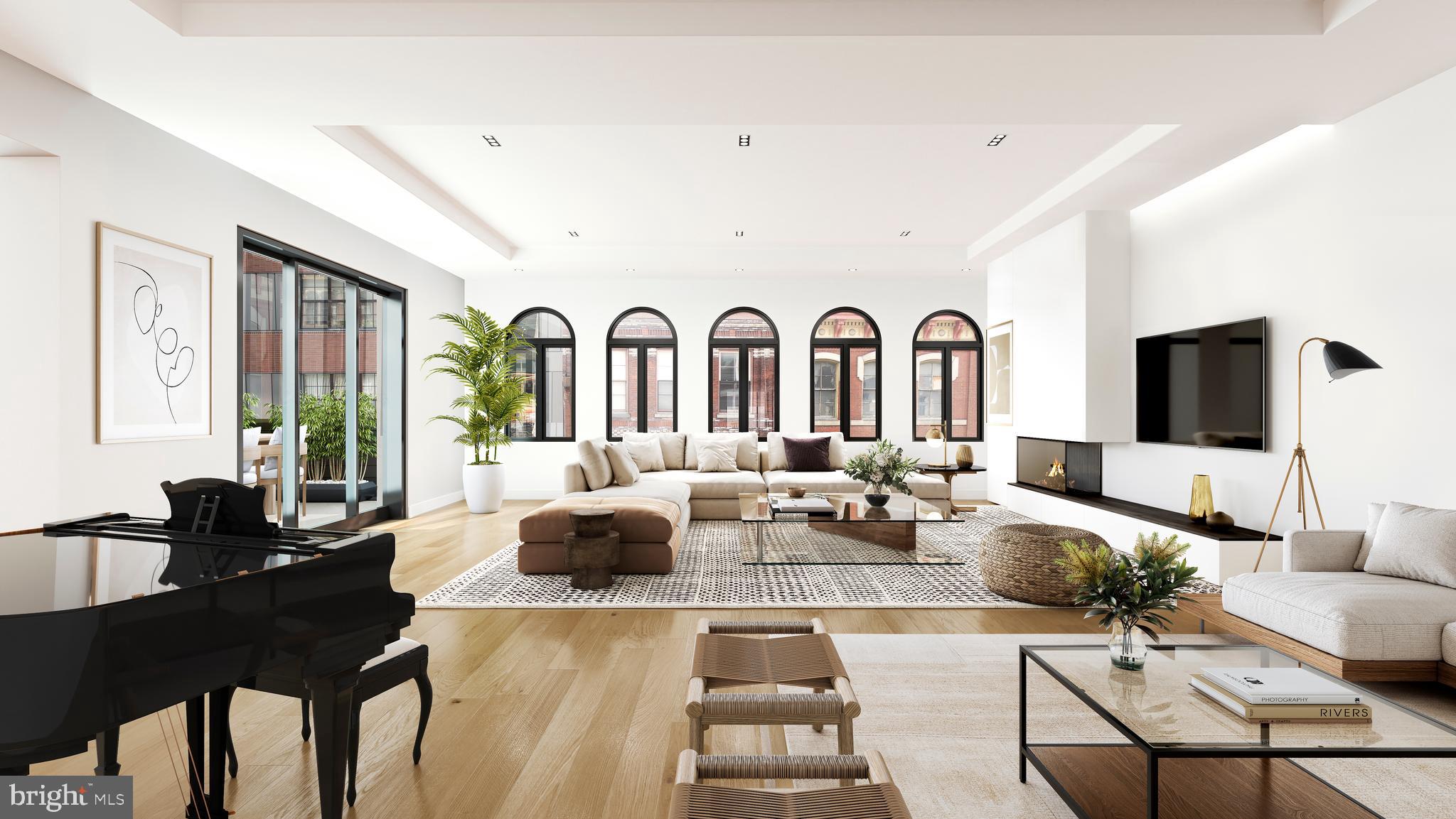Welcome to Old City's most exciting boutique development; thoughtfully restored, redesigned and reimagined into a remarkable collection of six unique residences. Each loft-like home exudes a modern sophistication defining luxurious living with over-sized windows, high ceilings, hand selected artisanal finishes, and sprawling layouts. Unit 4 spans the entire 4th floor of both 113 & 115 Arch Street. Nearly 45 feet wide and 120 feet long with nearly 4,800 square feet of interior space, this home is truly one-of-a-kind. Inspired by the buildings iconic architecture and timeless beauty, you ascend by private elevator into a magnificent open room with over 10-foot ceilings instantly drawing your attention to the large arched windows and 340 square foot terrace accessible by both the living and dining areas. The open chefs kitchen, designed by the Idea Group and is filled with custom cabinetry and top-of-the-line stainless steel appliances, including a wolf range, a coffee system and Sub-zero refrigerator. This home is complete with 5-bedrooms, 5.5-bathrooms and a separate den. A generously sized master suite with views of the Ben Franklin bridge includes a custom closet system by Pianca and an en-suite five fixture bathroom complete with radiant heat flooring, large soaking tub, and an abundance of storage space. All other bedrooms feature oversized closets and en-suite baths of their own. Designed by Urban Space Development, 115 Arch Street is a condominium conversion of two adjacent industrial buildings. In a true testament to technological innovation, the property is equipped with a virtual intercom system, enabling its residents? remote access to their home. It is through the rear of the building that owners have access to their private automated indoor parking space. Each unit comes with a deeded parking space, licensed storage room, and 10-year tax abatement. All appointments will take place at the sales office, 1315 Walnut Street, Suite 1325.