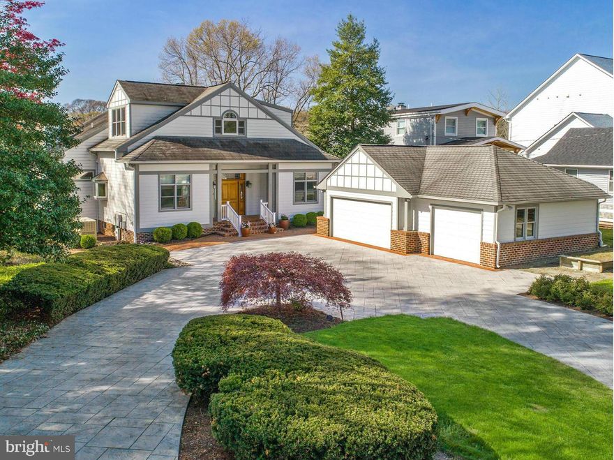 Craftsman architecture meets modern design with open floor plan and high ceilings. Great Room, gourmet kitchen, hardwoods, granite, stainless, built-ins. Main-level master and waterfront screened porch. Full basement w/ walkout. Picturesque .93-acre waterfront lot with stamped concrete circular driveway; features private pier w/ 2 slips and 6 ft. MLW, 3-car detached garage, whole house generator