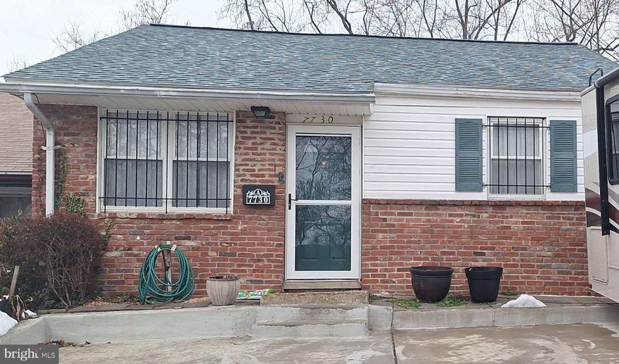Welcome to this charming 3-bedroom, 1.5-bathroom home located at 7730 Normandy Rd in Landover, MD. Spanning approximately 950 sq ft, this residence boasts an open floor concept that seamlessly connects the living and dining areas, perfect for entertaining. The upgraded kitchen is designed for modern living, while recent renovations, including a brand-new roof, fresh paint throughout, and stylish laminate flooring, ensure a move-in ready experience. Enjoy the convenience of large off-street parking for up to three vehicles and unwind on the spacious back patio. This home is a perfect blend of comfort and functionality! 

All furniture has been virtually staged.