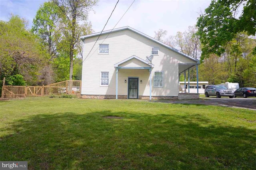 Spacious 4 Bedroom 2 Bathroom single family home located just outside of Lykens.  Cozy, oversized living room features an inviting fireplace set into a rustic featured wall.  Recently renovated kitchen with hardwood floors and appliances.  Newly renovated upstairs and downstairs bathrooms.  Master bedroom includes a balcony overlooking a roomy backyard.  Huge additional storage building located behind home.
