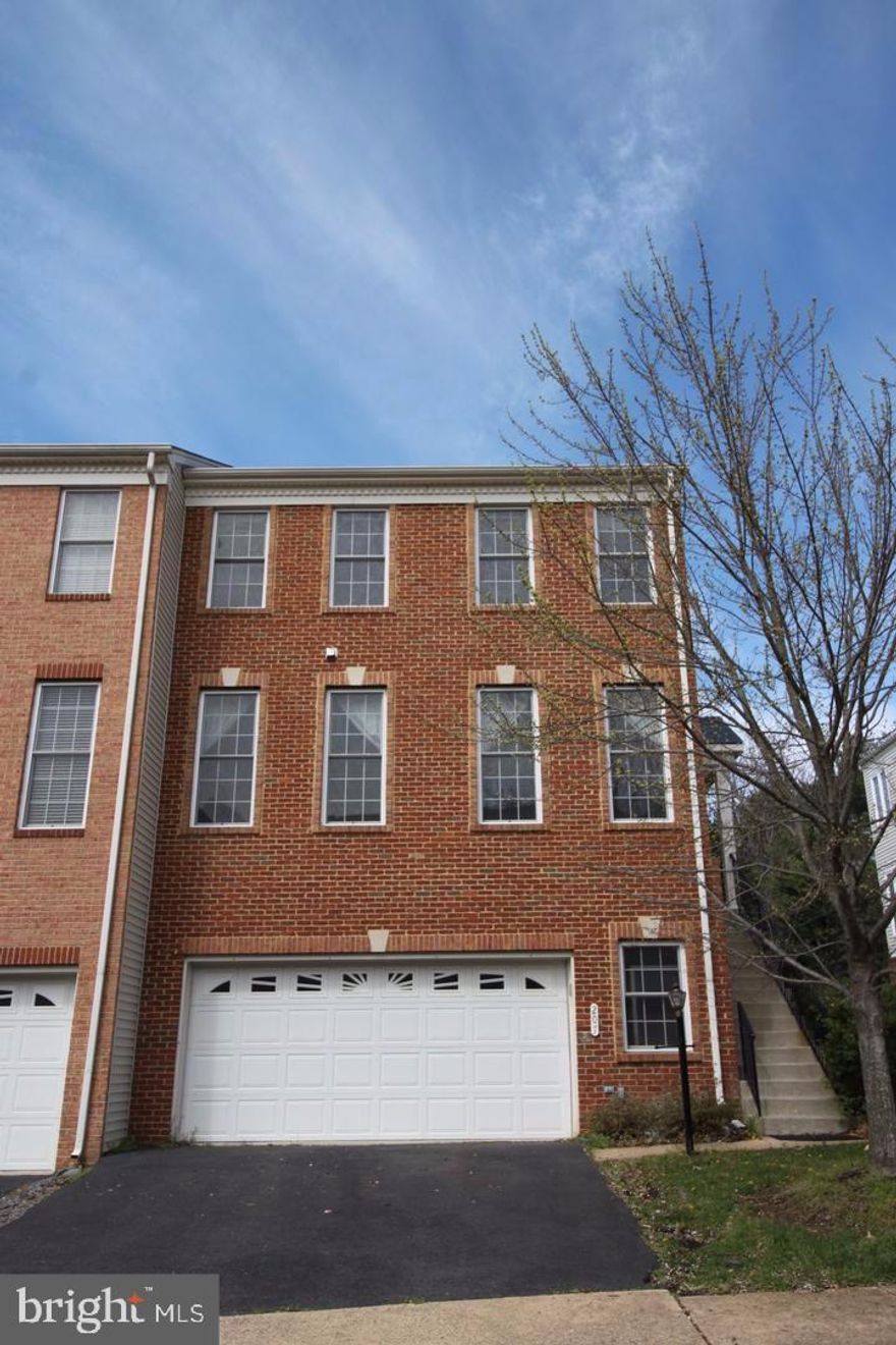 This fantastic townhome has over 2400 sq. feet of living space! Gorgeous end unit, offers stunning hardwood floors on main level, huge kitchen, wood burning fireplace and deck. Newer high end vinyl plank floors upper and lower level. Open floor concept, lots of sparkling light, 3 upper level bedrooms with a huge Master suite and walk in closet. Upper level laundry room with newer washer and dryer. Walking distance to schools, grocery shopping and Starbucks! This townhome is gorgeous and a must see.