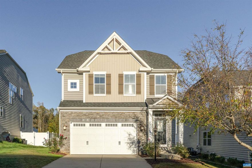 Don't miss out on this charming home! A wonderful floor plan offering open concept living on the main level with hardwood floors, granite counters, kitchen island, maple cabinets, gas range and custom shelving. The second floor features a spacious owners suite with a large walk-in closet and soaking tub. Two additional bedrooms share a second full bath. The bedroom level laundry room features stacked washer/dryer and custom built in storage. The basement offers a large rec room with full bath and a home office or theater space. Additional features include a 2 car garage with built in storage, ADT security system, rear deck with fully fenced in yard and concrete pad. Well maintained and waiting to welcome its new owners.