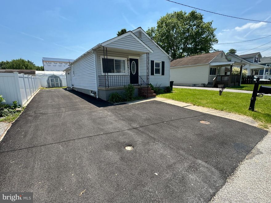 Sitting on an awesome lot, wrapped in vinyl fencing and topped with a newer roof (4 years old), this 3 Bed, 1 full Bath, Ranch offers more than meets the eye from the outside with all of the "big ticket items" taken care of! You HAVE to step inside and see it to believe it! Beyond the 4, or 5, car driveway (brand new) and through the covered front porch, the Living Room greets you with it's newly refinished hardwood floors, large window, charming archways and classic glass doorknobs - not to mention new lighting, a convenient coat closet and access to the rest of what 329 Cresswell Rd has to offer. Flooded with natural light, through the Living Room, you can step into the updated full Bath and either of the good-sized Bedrooms in this part of the home - all with fresh paint and carpet. Heading to the other side of the Living Room, you'll pass through the updated Kitchen, complete with new appliances, new fixtures, updated cabinets, countertops, painting, lighting, access to the rear Family/Dining Room and the third Bedroom complete with fresh paint, carpet and a custom closet - all with new flooring, fixtures and piece of mind to know that everything has been updated and ready to just move right in! Speaking of turn-key, don't forget to visit the basement. Housing not only a brand new HVAC system, but updated appliances, fresh paint, and a completely blank canvas that you can make all your own - stand up and let your ideas stand out! Make this space whatever you like! While close to parks, entertainment, shopping, major transportation routes and so much more! MUST SEE!