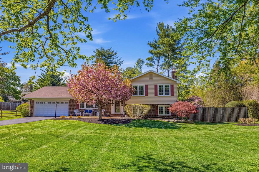 Updated, move-in ready, cul-de-sac opportunity on nearly half an acre in sought-after Clarkes Landing. 
Tucked away on a quiet cul-de-sac, 11224 Stamper Ct offers the space, privacy, and updates today’s buyers are looking for. This well-maintained split-level home sits on nearly half an acre and has been enhanced inside and out for comfortable, everyday living.
From the moment you enter, you’ll notice the bright, open feel with refinished hardwood floors, fresh interior paint, and updated lighting. The main level features a spacious living room, a dining room with sliding doors to the backyard, and a refreshed kitchen with abundant cabinetry, eat-in table space, and a stylish backsplash.
Upstairs, the primary suite includes two closets and an en suite bath. Three additional bedrooms and a hall bathroom complete the upper level.
The lower level offers exceptional flexibility, featuring a comfortable family room centered around a wood-burning fireplace with a classic brick hearth, an additional bedroom or private office, a half bath, and a laundry room with direct access to the backyard—ideal for everyday living.
Major system improvements provide peace of mind, including roof, siding, and gutters (2018), Trex deck (2023), water heater (2024), water main line (2024), furnace blower (2024), garage door and motor (2023–2024), driveway (2022), and comprehensive drainage enhancements including French drains, crawl space waterproofing, and LeafFilter gutter guards (2020).
Outdoor living is equally inviting, with a Trex deck, patio, and firepit creating the perfect setting for entertaining or relaxing in the private, fully fenced backyard.
Additional features include an oversized two-car garage with ample storage and a storage shed for added convenience.
Located in the sought-after Clarkes Landing community, residents enjoy access to a neighborhood park, a welcoming atmosphere, and convenient proximity to Vienna, Oakton, Reston, and Fairfax. The home is also part of the highly regarded Flint Hill Elementary and Madison High School pyramid.
A prime cul-de-sac setting with space, privacy, and updates throughout—this home is ready for its next chapter.