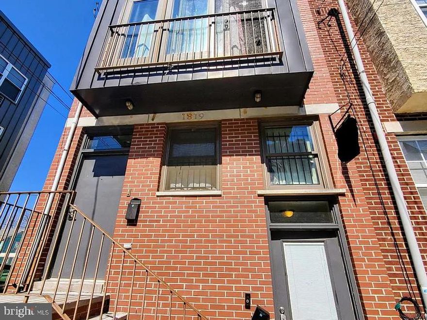 Outstanding location just a few blocks to Temple University's main campus, this is a monster income producing duplex that is truly a turn key investment property. This is a well maintain property with functional layouts. Similar duplex's bring in a range of $5000 -6000 monthly . Each unit in this building features Hardwood floors, Kitchen with Granite counters and high end finishes, and nicely sized bedrooms that can easily accommodate large beds and additional bedroom furniture. The first floor unit exits to a private fenced rear patio. The second floor unit has an expansive living room with a large, almost floor to ceiling window and Juliette balcony. Both units have Washer and Dryers and separated utilities. Utilities are all electric and tenants responsibilities. The only utility the owner would be responsible for would be water and taxes. This property offers abundant value and will start bringing in cash flow immediately.