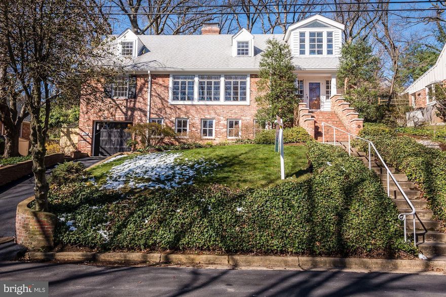 Spacious sundrenched brick home with 4 bedrooms, 2 full baths sits on a hill in a park-setting. This 3,109 three level home in Alexandria features lovely hardwood floors, large living room with wood-burning fireplace, french doors leading to the brick patio/backyard, two staircases to the upper level, full basement,abundance of storage, 4 skylights, 1-car garage and lots more!!