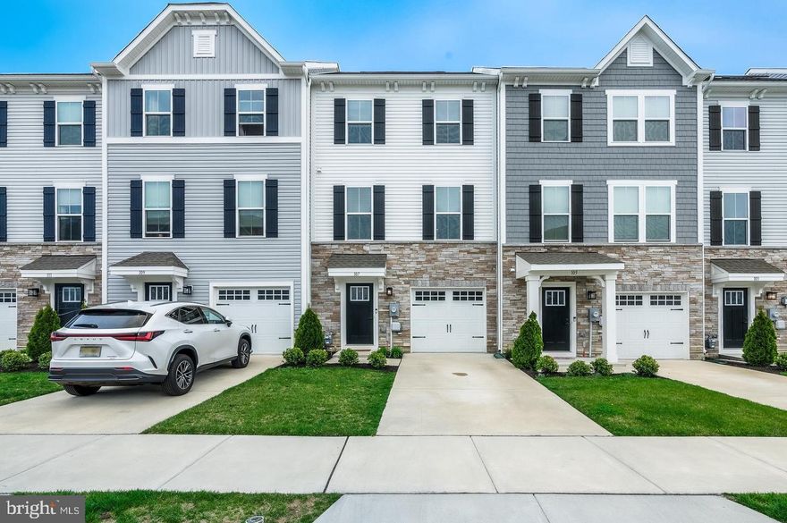 Welcome to the Townes at Haddon Pointe, only 3 years young and conveniently located a short distance from shops and restaurants in Cherry Hill, and within 15 minutes to Philadelphia. Easy access to the highway makes your morning commute a breeze! As you step into this thoughtfully laid out townhome, you are welcomed by a bright entry way, one car garage, ample closet space, and a generously sized en-suite bedroom with full bath and outdoor access. This room can also be used as a den, office, or home gym. As you make your way to the main level, luxury vinyl plank flooring extends the full, open concept, living, kitchen, and dining space. The entire space is bright and inviting. The kitchen features an extra large island-perfect for entertaining, quartz counter tops, and sleek stainless steel appliances. The home also has a private deck off the kitchen for outdoor entertaining as well. Upstairs you will find two additional spare bedrooms with neutral paint and carpeting, the hallway bath, & a full sized washer and dryer. The primary bedroom boasts plenty of natural light, tray ceilings, and walk in closets. The en-suite offers a walk in shower, soaking tub, and double vanity. With over 2000 sqft of modern luxury, don’t miss the opportunity to see this one in person!