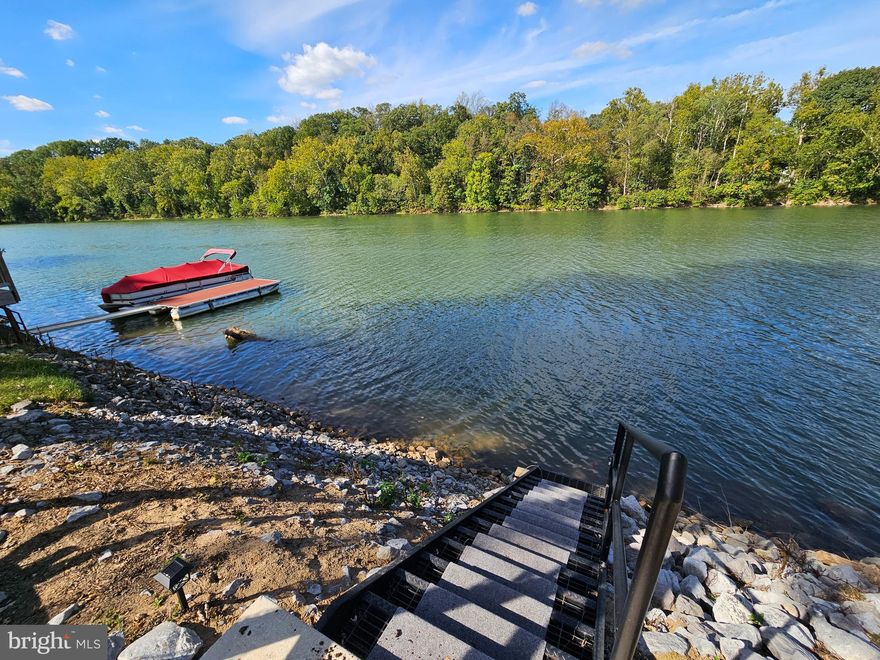 *Coming Soon* More Photos to come. 
 Tired of putting your boat in and out? Well, Look no further.

Welcome to River Front Block 139 lot 56 Boo Boo Blvd in Riverbends Rv Campground. Riverbend is 400 Acres of SEASONAL recreational campground full of amenities located on the Potomac River in Falling Waters, Wv. OPEN APRIL 1 - NOVEMBER 1 - This is a fun & entertaining community, yet relaxing. 

 This lot is stunning, beautifully maintained and located right on the Potomac River with direct access to boat, fish or just sit by the beautiful scenery. A Pontoon Dock, Catwalk, sturdy metal steps, Jet Ski Dock, and Jet ski all convey. This lot is a very large, long lot with plenty of parking, yard space for activities, concrete pad and graveled firepit area at the rivers edge and so much more.  Must walk it to appreciate the peace and joy that it brings.
A large stick-built Pavilion with a metal roof, electric, roller shades all covering a concrete pad and everything in between conveys. Including the camper, attached bunk house with a bathroom & A/C, outdoor kitchenette area with cabinets, sink, 150 Gallon holding tank, tiki bar, golf cart, riding mower and more.  
 Bring your boats, friends and water toys.

 Call today for your personal tour. Approx. 10 miles of Deep water on the Potomac River access for boating, fishing & swimming. Yearly membership ($1,987) plus a $200 initiation fee for new owners, includes water, Pump outs, electric, trash and the park amenities such as 3 pools, putt putt course, Horseshoe club, Boat club, Poker runs, Trick or Treat, Christmas in July, live bands, basketball court, tennis court, fireworks, car show, Church, restaurant, bar, convenience store (Great food), playground, volleyball, ball field and much much more. Bring your golf carts, water toys and come enjoy life!