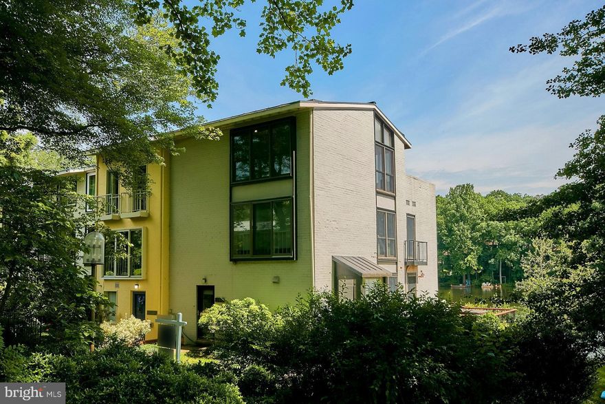 Every once in awhile a special home comes along and this is that house - first time for sale in 50+ years and the legal description says it all - lot 1 block 1 section 1 Reston. Three finished levels, 3/4 bedrooms, 3.5 baths with the most spectacular water views from all major rooms.  An original Chloethiel Woodard Smith, FAIA design in Reston's first and most sought after cluster. Carport!