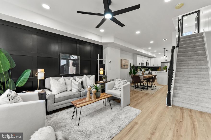 1623 Rutland Ave | Broadway East, Baltimore, MD
Offered at $249,900

Modern style meets classic Baltimore charm in this fully renovated Broadway East rowhome. Behind the bold navy façade, a bright and open layout connects living, dining, and kitchen spaces designed for both comfort and entertaining. The kitchen stuns with Panda quartz countertops, matte black backsplash, and stainless steel appliances—a sleek, contemporary statement. A full bath on the main level adds convenience for guests.

Upstairs, the primary suite features custom wall detailing and a spa-inspired bath with marble-style tile and black hex flooring. The second bedroom offers flexible space for a guest room, nursery, or home office, while the finished lower level provides a third bedroom, bonus living and storage options.

With luxury finishes, thoughtful design, and proximity to Johns Hopkins and downtown Baltimore, this home delivers exceptional value in a neighborhood on the rise. Schedule your showing today!