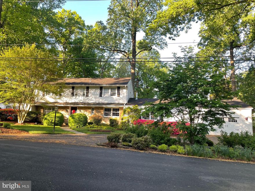 Gorgeous Updated Colonial in sought after Manor Country Club Community just steps to the Club. Home features 5 Bedrooms with 3 1/2 Baths.  First floor guest bedroom with an ensuite bath.  1st floor Study with a fireplace and view of the beautiful rear yard.  Large Family room with a beautiful gas fireplace.   Kitchen with stainless steel appliances opens to a large breakfast room.  Large Living room with fireplace, Dining Room and Powder room round out the main level.  Large Primary Bedroom features a walk-in closet, hardwood floors and a renovated bath. Three additional large bedrooms with hardwood floors and a hall bath round out the upper level. 3 Fireplaces, Newer Windows, Hardwood Floors, Large Gorgeous Rear Yard. Country Club Membership Conveys.....this home has it all!