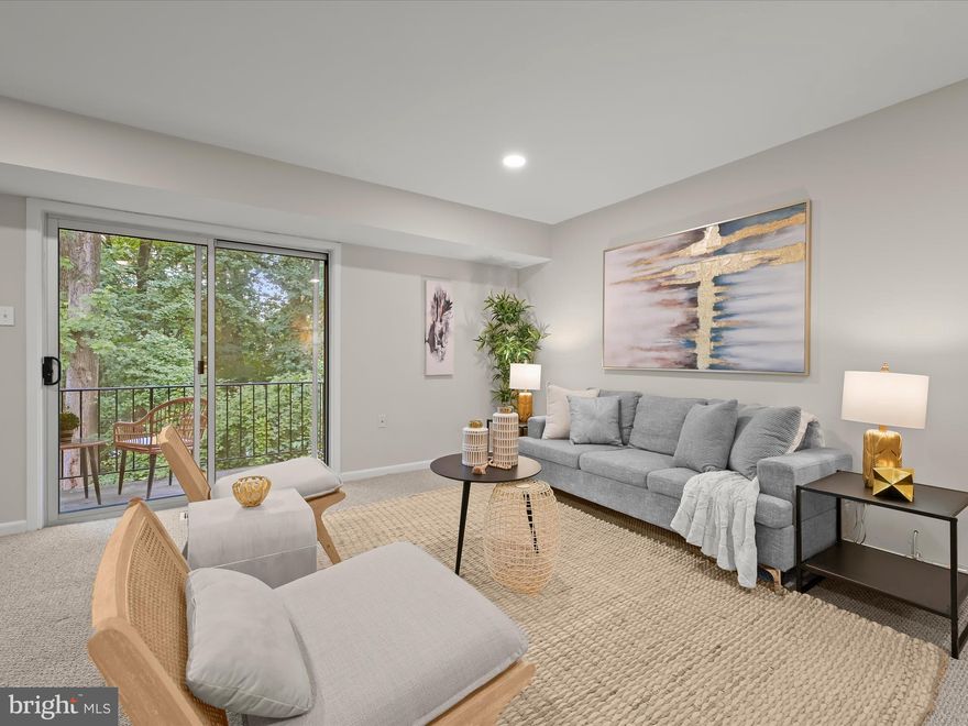 Welcome to one of the largest one-bedroom floor plans in the sought-after Parkside community—beautifully updated, spacious, and ideally located in Bethesda. This rarely available layout offers generous square footage, thoughtful renovations, and peaceful green views in a tranquil, park-like setting just minutes from Grosvenor Metro, Pike & Rose, Rock Creek Park, downtown Bethesda, major commuter routes, and more!
Step into a defined entry foyer with durable luxury vinyl plank flooring and a roomy hall closet. The beautifully renovated kitchen has been opened to the living and dining areas, creating a seamless and inviting space perfect for everyday living and entertaining. Enjoy quartz countertops, custom white soft-close cabinetry (including pantry with rollout shelves), sleek modern fixtures, a gas range, and a newer stainless steel dishwasher. The expansive living/dining area with recessed lighting offers flexibility for a home office or an additional seating area and opens to a large private balcony with lush, tree-lined views ideal for relaxing outdoors. Tucked away off a private hallway, the serene bedroom suite offers a peaceful retreat with a full wall of closets, an additional hallway closet for exceptional storage, and oversized thermal windows that frame green views and fill the space with natural light. The full bathroom has been tastefully updated with new fixtures. Additional highlights include energy-efficient thermal windows and an updated HVAC system. Highlights of the Parkside community include an outdoor pool, tennis courts, a playground, on-site management, additional storage, ample parking, and so much more! Move-in ready and filled with charm, this condo offers the perfect combination of space, style, and location in one of Bethesda’s most convenient communities.