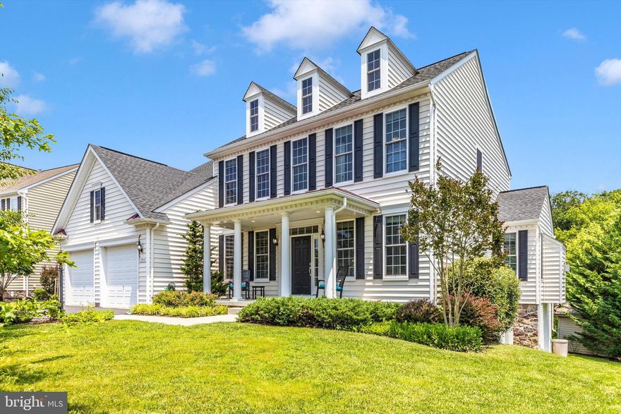 Welcome to 2304 Kings Forest Trail, nestled in the prestigious Woodlands at Nottingham community.
Step inside this freshly painted Catonsville Homes colonial and prepare to be captivated. Offering 4 spacious bedrooms and 3.5 bathrooms, this elegant home blends timeless charm with modern amenities while offering a sprawling, tree-line wooded backyard.  Wooded lot brings privacy and a space where you can build a tree house. This neighborhood has the best amenities! You are just a hop skip and jump away from the playground, soccer field, walking path, in addition to basketball and tennis/pickle ball courts, 3 playgrounds, sidewalks and a community pool w/membership available, and a couple open sports playing areas. Fantastic tucked-away community, you are minutes away from Main St, 3 grocery stores, shopping, restaurants, Watkins Park, Rails to Trails and commuter routes to Baltimore, DC, Fort Meade, Frederick, Westminster and beyond
From the moment you arrive, the inviting front porch sets the tone. Enjoy peaceful mornings on the expansive private deck or unwind in the serene three-season Florida room — a true retreat for both relaxation and entertaining.
As you enter, transom and sidelight windows surround the front door, flooding the foyer with natural light. Gleaming hardwood floors guide you into a flexible formal space — currently styled as a sitting room but easily suited for a formal dining room — complete with classic crown molding.
Working from home? You’ll appreciate the dedicated office, accented with French doors and a transom window, offering both functionality and style.
The heart of the home is the open-concept living area, anchored by a gourmet kitchen featuring granite countertops, a gas cooktop, double wall ovens, SS appliances, and a pantry.  There is a Whole House Water Osmotic Filtration system – Your plumbing, clothes, hair and health will love this!
 From here, step outside to the beautiful deck, perfect for al fresco dining, or make your way to the mudroom with built-in cubbies and direct garage access — an ideal space for everyday organization.
The adjacent family room is filled with natural light from large windows and centers around a cozy fireplace, creating a warm, elegant ambiance.
The finished lower-level impresses with 9-foot ceilings, a full bath, and walk-out access to a brick paver patio. This level offers a spacious layout for entertaining or relaxing, complete with a bonus room offering cabinets outfitted with a wet bar boasting Caesarstone Quarts countertop rugged concrete, perfect space for movie nights or game days. You’ll also find a bonus space and two generous storage areas for added flexibility.
Upstairs, the Primary Suite is a true sanctuary with a large walk-in closet and a spa-like ensuite featuring a luxurious soaking tub and dual vanities. Three additional generously sized bedrooms, a full bath, and a convenient upstairs laundry room with utility sink complete the upper level.
Experience the epitome of relaxation and refinement in this tranquil retreat, where every detail has been thoughtfully curated to elevate your living experience. Start planning a BBQ to show off your beautiful home. This home is a must see. 
Move here and you will love where you live!