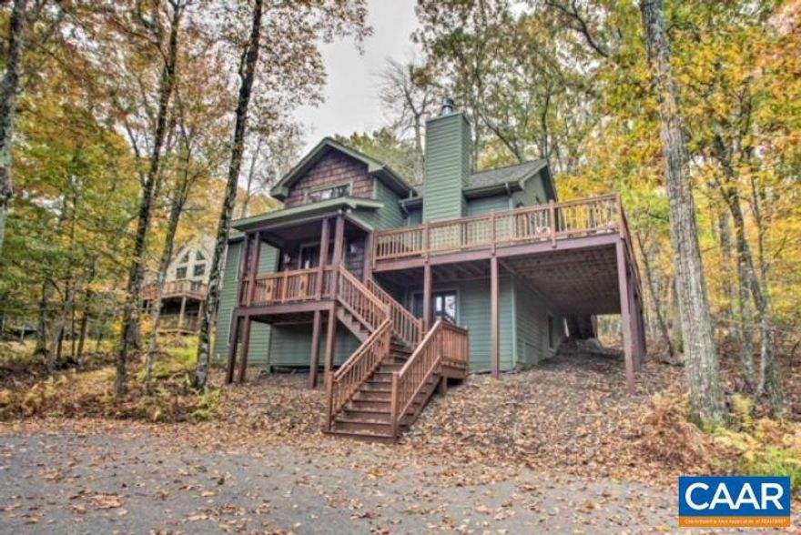 Welcome to your mountain escape in the heart of Wintergreen Resort! This beautifully maintained 3-bedroom, 2.5-bath home offers the perfect blend of comfort, privacy, and four-season adventure. Offered turnkey with a solid rental history. Whether you're looking for a full-time residence, weekend getaway, or investment property, this home delivers mountain living at its best. Highlights include spacious open-concept living area with vaulted ceilings, stone fireplace perfect for cozy winter evenings, kitchen with granite countertops & stainless steel appliances. Hardwood floors and abundant natural light throughout. Lower level family room is being used partially as a 4th bedroom.,Granite Counter,Wood Cabinets,Fireplace in Great Room