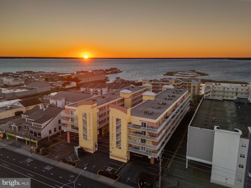 OPEN HOUSE SATURDAY Dec. 27th  11:00AM - 1PM   
Imagine this: A breathtaking Western sunset over the Bay, washing away all your cares & concerns from the past week! 5405 Coastal Highway #406 includes a 2 Bedroom 2 Bath home that brings the outdoors in! From the living room, dining space or OWNERS SUITE enjoy the wrap around private balcony with elevated views of a Bayside retreat! 
You’ll feel like you’re living in a dream! Your day begins with a 1 block stroll to the beach then finishing the afternoon being spoiled taking the salt air down a notch at the pool! DEEP SEA FISHING, CRABBING, enjoying AMUSEMENT PARKS or AN EVENING CONCERT at the OCEAN CITY INLET!
Location, location, location… This home is right in the heart of FUN! Don't forget OUTLET SHOPPING right around the corner!!
54th Street is  blocks from the RT 90 & RT 50 Bridge! Great spot to HELP CELEBRATE Ringing in the NEW YEAR… 2026… Help our country kick off 250 Years of FOUNDING OUR COUNTRY with an amazing New Years Fireworks, Saint Patrick’s Day Parade, Memorial Day, Fourth Of July Extravaganza, then Labor Day including numerous weekend concerts, car shows and specialty Sun & Fall Festivals. This 2 Bedroom 2 Bath home is sold furnished and can comfortably sleeps 6-8 people with GREAT RENTAL HISTORY from Nov. 2018 - Dec. 2024
Recent updates include: 
New Refrigerator (2020),HVAC Unit (2021),Dining Room Table & Chairs 2022, Living Room Furniture (2022), New Luxury LVP Flooring (2023), Microwave (2025)  
Don’t forget Fitness Center for weights and cardio room too! Keep your Bike, Paddle Board or Kayak in the designated areas for a small fee for the season!
So, what are you waiting for? Come and experience the best of both worlds: the thrill of living in a beautiful home and the best location! Don’t miss out on this incredible opportunity! This home has 2 elevators that take you  to your next home!!!