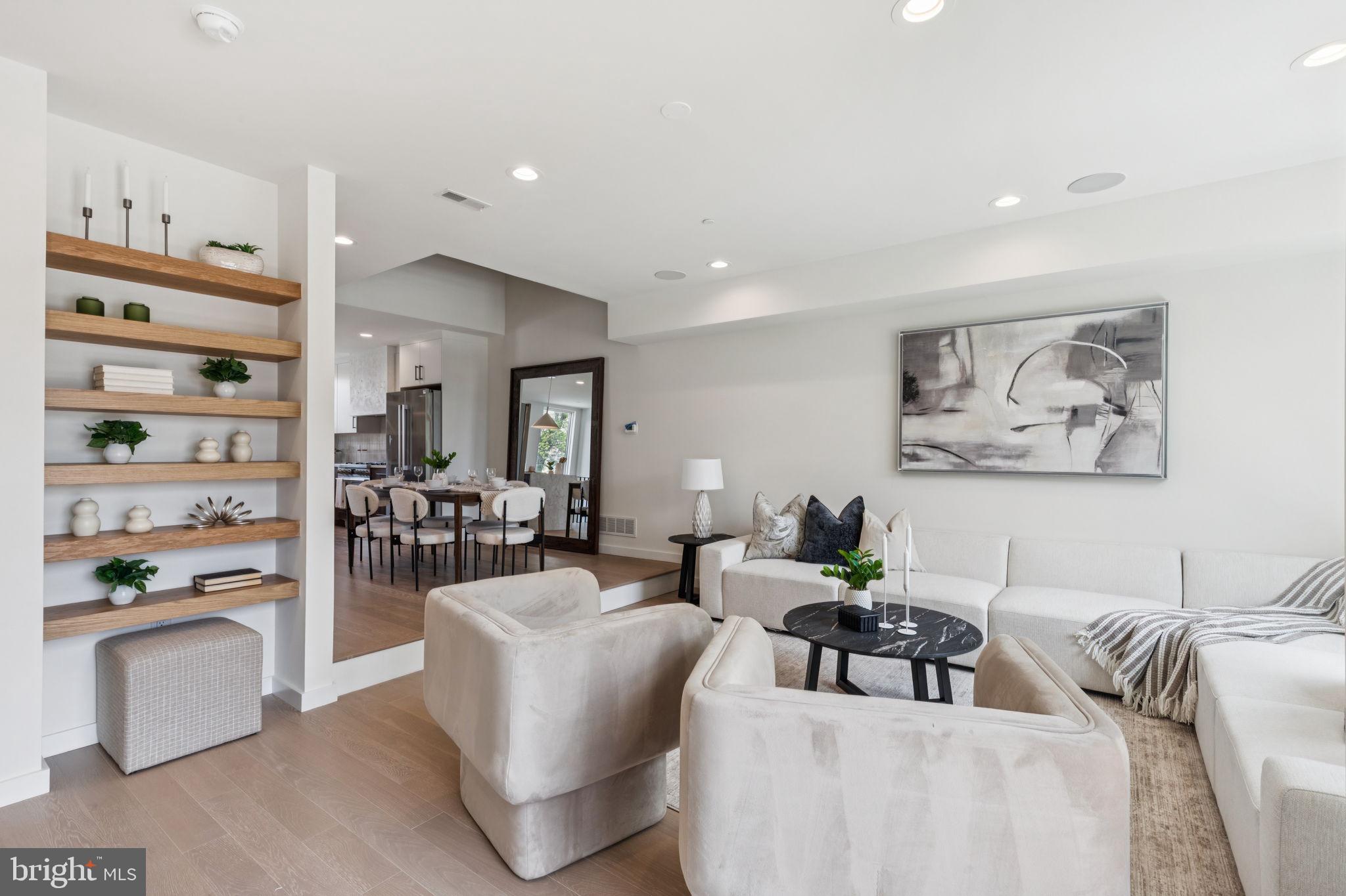 Welcome to Wendle Place Phase III - The 9 homes in Phase III offer a different layout option from Phase II, and offer 4 bedrooms, 3 full baths, 2 half baths, 2-car garage parking, multiple outdoor spaces, and private rooftop decks with green roofs. Every residence includes a 10-Year Tax Abatement and a 1-Year Builder’s Warranty. As you enter the homes, you'll find a nice sized bedroom / office space / den, and your 2 car garage. Up to the second floor, you'll find an open-concept living floor with a stunning chef’s kitchen, a large living & dining area, and a private deck—perfect for entertaining, grilling, or unwinding. The third floor hosts two well-appointed bedrooms, each with its own full bath. One offers an en-suite with a stand-in shower, while the hallway bathroom features a luxurious soaking tub. A spacious laundry room, accommodating side-by-side appliances, completes this level. On the third floor, the primary suite is a serene retreat. The light-filled bedroom includes a Juliet balcony, a generous walk-in closet with built-in shelving, and a spa-inspired bathroom with a soaking tub and a dual rain head shower. In the hallway, you'll find a half bathroom to accommodate guests, as well as a wet bar leading to the private rooftop deck. This deck offers sweeping city views and an eco-friendly green roof system that enhances insulation and temperature regulation. Wendle Place is steps from the neighborhood’s most beloved destinations, including Bardot Café, Café La Maude, North Third, and Liberties Walk. Enjoy easy access to boutique shopping, bike paths, and public transportation, with Center City just minutes away. Developed by Catalyst City Development and designed by Gnome Architects, Wendle Place combines craftsmanship with convenience. The community features a private drive aisle and an exclusive dog park. Homes in Phase III start at $999,999, with optional upgrades such as a fireplace, enhanced primary suite, tech upgrades, and more. For detailed information on customization options and availability, contact us today to schedule your walkthrough. ***This house qualifies for a loan program that gives a discounted interest rate on a 30 year fixed mortgage with preferred lender, no mortgage insurance, and a lender credit. The lender credit is for first time home buyers only, but the discounted rate & waived mortgage insurance apply to all buyers who qualify. Inquire for more information.***