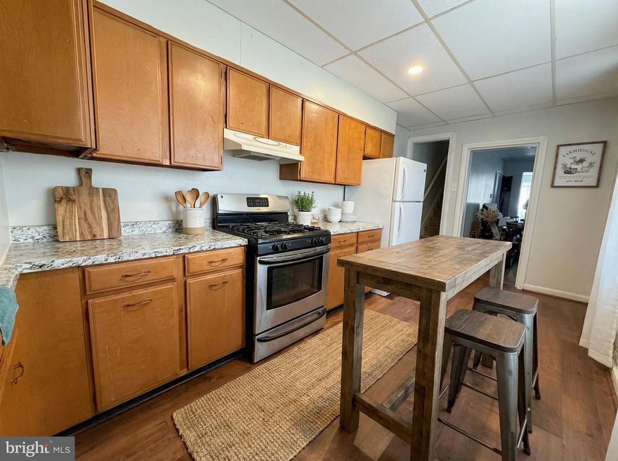 Charming Rowhome By The Ballpark In York City

There is something special about a home that has stood the test of time, and this two story rowhome captures that feeling beautifully. Built in 1900, this 4 bedroom, 1 bathroom property offers 1,370 square feet of living space in a location that makes city living easy and enjoyable. Situated just minutes from Route 30 and Interstate 83, commuting is simple and convenient, while the unique positioning between Codorus Creek, the railroad tracks, and Revolution Stadium helps create a more tucked away setting within the city.

Inside, you will find a layout that feels both comfortable and practical, featuring two spacious levels along with a finished attic that adds flexible living space. Central air conditioning and forced gas heat provide year round comfort, and existing appliances make ownership seamless from day one. A detached garage offers valuable storage and potential off street parking if converted with a garage door, a feature that is appreciated in York City properties.

For investors, this property presents an immediate income opportunity. The current tenant pays $1,250 per month through the Section 8 housing program and also covers all utilities, offering consistent rental income with reduced owner expense responsibility.

Living here means being close to some of York’s favorite local destinations. Enjoy morning coffee at Prince Street Cafe or The Green Bean Roasting Co., brunch at Roost Uncommon Kitchen, or dinner with friends at Rockfish Public House or White Rose Bar and Grill. The historic York Central Market is nearby as well, offering a lively atmosphere filled with local vendors, fresh foods, and community connection.

The location provides excellent accessibility beyond city limits. Interstate 83 offers direct routes north toward Harrisburg and south toward Maryland and Baltimore, while Route 30 makes east west travel toward Lancaster and Gettysburg easy. Business Route 83 and surrounding local roads help streamline daily commuting and weekend plans alike.

York City continues to grow while maintaining its historic charm, and this home places you right in the center of that momentum. Tree lined streets, historic architecture, local art spaces, and a thriving small business scene create a lifestyle that feels both vibrant and authentic. Whether you are expanding your investment portfolio or looking for a property with character, income potential, and strong location benefits, this rowhome offers a compelling opportunity.