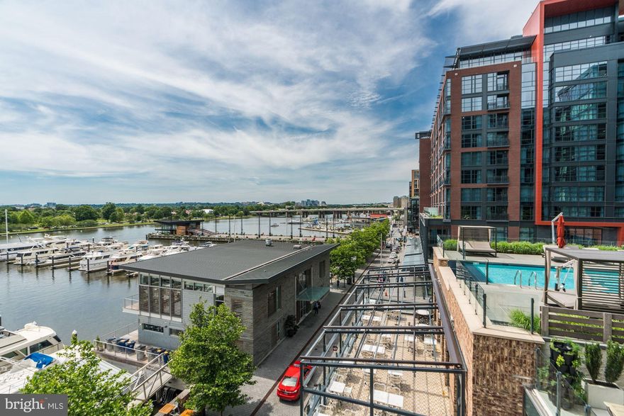 Ready for a lifestyle change? Here it is! One of the hottest locations in the City, the Southwest waterfront, offers spectacular, low maintenance living in the coveted, award winning PN Hoffman built, waterfront condo, The VIO.  This rarely available 3 bedroom, 2,500 SF, apartment has the most awesome views with floor-to-ceiling windows overlooking the sparkling river.  The contemporary inside invites the outside in.  9' ceilings, wide plank hardwood flooring, a Porcelanosa kitchen with quartz countertops and marble bathrooms offer all the luxury you could desire.  This condo has private access from the garage level.  Outside, cobblestone streets below intertwine top rated restaurants, shopping and music venues like the Anthem.  Arena Stage, the International Spy Museum and Nationals Park are a quick uber ride away.  The VIO offers full security with a 24 hour front desk with concierge and porter services, a gym and yoga studio, a waterfront garden with a grill and sundeck, infinity pool, resident lounge w/an espresso bar & more!  Sell your furniture and the car and get inspired with waterfront living at The Wharf.  You will be glad you made the change!!