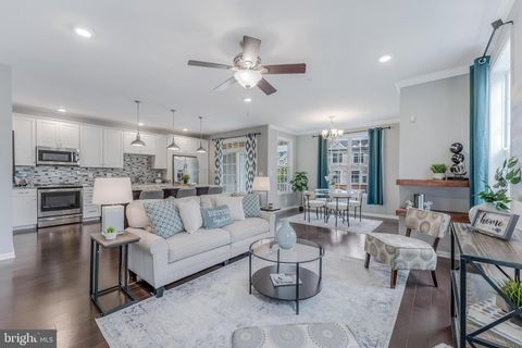 Photo of 23266 Southdown Manor Terrace #105, ASHBURN, VA 20148 (MLS # VALO2123950)