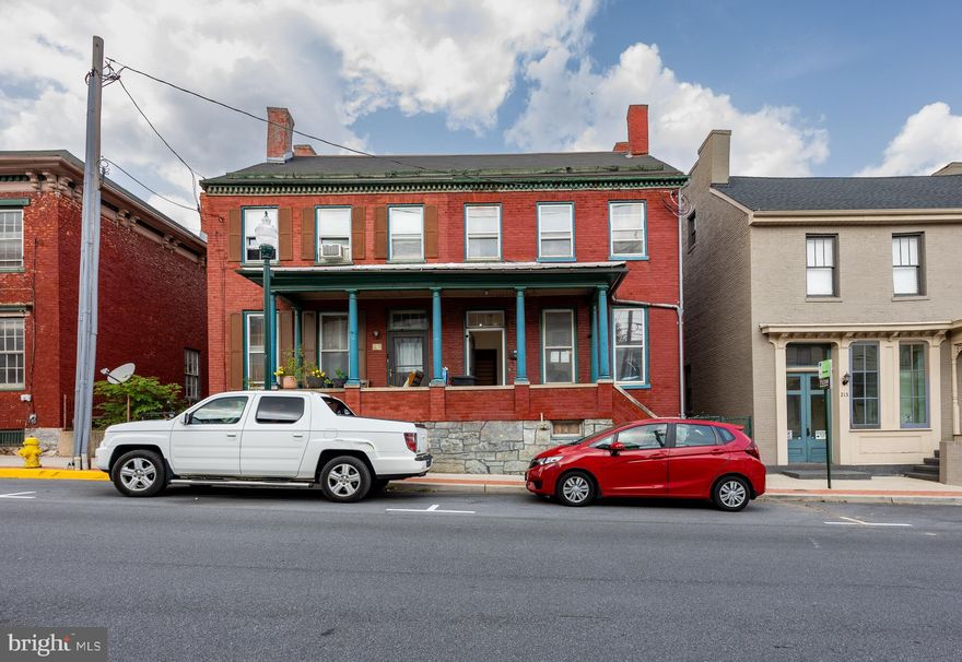 Welcome to 209 E. Martin Street, Martinsburg, WV 25401!
Originally built in 1857, this beautifully renovated duplex blends historic charm with modern convenience. Whether you're looking for a single-family home, an income-producing duplex, or a live/work space, this property offers exceptional flexibility.

Located just steps from the Caperton Train Station and the Historic Roundhouse Complex, it's a prime spot for commuters or those exploring AirBnB investment opportunities. Inside, the home retains much of its original character while featuring thoughtful updates throughout.

Enjoy the vibrant energy of downtown Martinsburg — with its unique shops, local restaurants, and year-round events — all just a short stroll away. When it’s time to unwind, retreat to your private, fenced backyard—perfect for outdoor dining, pets, and play.

Don’t miss this rare opportunity to own a piece of history in the heart of Martinsburg!