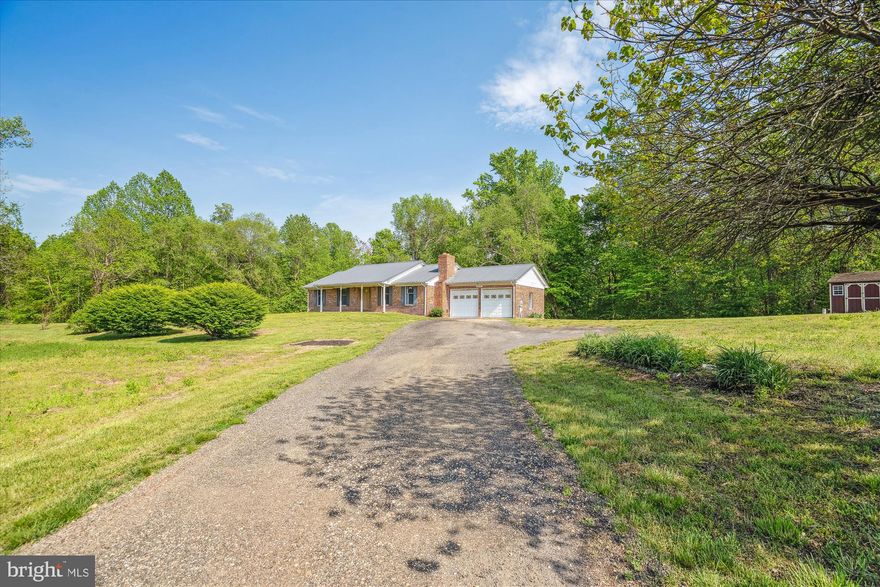 Price Improvement! Don’t miss this rare opportunity to own 7.35 acres in Prince George’s County’s sought-after Rural Tier. Zoned AG (formerly OS), this property is ideal for a farmette, equestrian use, or private estate living. No HOA or covenants. The all-brick rambler features a durable steel roof, attached 2-car garage, and a custom brick fireplace ready for a wood stove. Interior highlights include a spacious country kitchen, cozy family/living room, and a large 24’x16’ rear deck perfect for outdoor entertaining. The huge partially finished basement has a full bathroom, a storage room, laundry room, a hobby room that can be used as a possible 4th bedroom and a large recreational room with unlimited potential.  There is a chimney flue access to also add a wood stove / pellet stove to the basement as well! The shed and run-in are sold as-is. Set on a private, open and wooded lot accessed via a shared gravel road, the property is currently farm-assessed for lower taxes.  Located along the Legacy Wine Trail, and just minutes from Merkle Wildlife Sanctuary, Jug Bay, and the Patuxent River Park system. FIOS Internet is available at the end of the driveway. Reasonable commute to Washington, D.C. metro area. A minimum of 5 acres per dwelling unit applies under AG zoning. The seller will not pay for the Agricultural Transfer Tax into residential use. All showings must be scheduled in advance. Buyer's representative must be present at all showings.