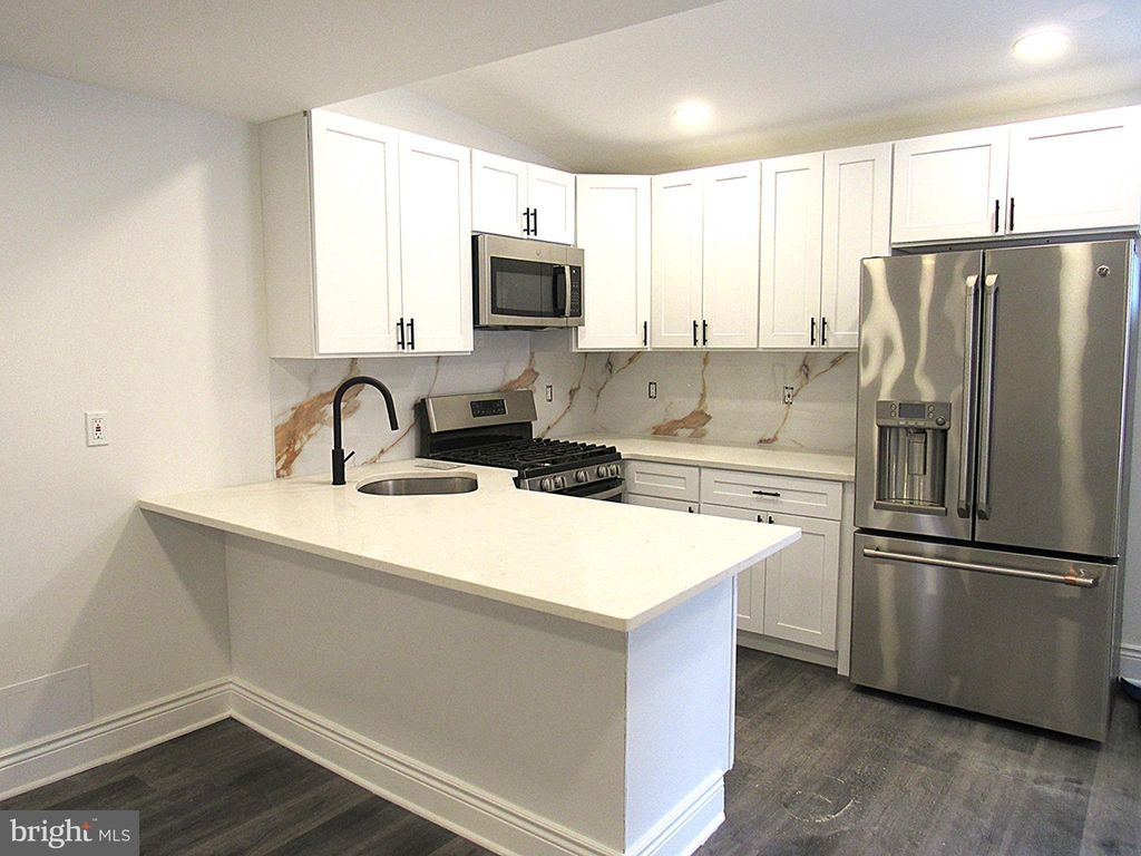 Photo of 708 Oak Lane #REAR APARTMENT, PHILADELPHIA, PA 19126 (MLS # PAPH2591994)
