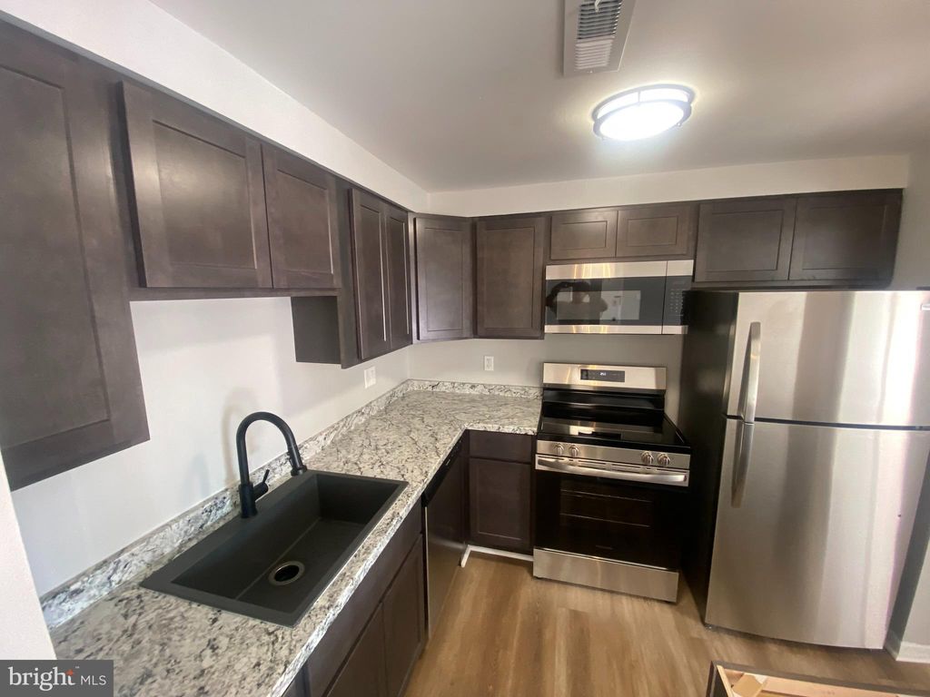 Photo of 10122 Campus Way S #304-1A, UPPER MARLBORO, MD 20774 (MLS # MDPG2167590)