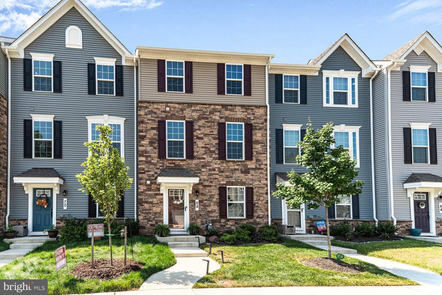 Discover the charm of this beautifully designed townhouse in the desirable Anchor Point community. Built in 2023, this contemporary home boasts a perfect blend of traditional and modern architectural styles, featuring a stunning brick front that welcomes you with warmth. Step inside to find an inviting interior with 1,720 sq. ft. of excellent living space. The main level showcases rich hardwood flooring and a traditional floor plan, ideal for both entertaining and everyday living. The spacious eat-in kitchen is a culinary delight, equipped with modern appliances including a self-cleaning oven, built-in microwave, and dishwasher. Enjoy cozy meals in the breakfast area or at the kitchen island, surrounded by recessed lighting that enhances the ambiance. With three generous bedrooms and four bathrooms (two full and two half), this home offers ample space for comfort and convenience. The fully finished basement provides additional living space, perfect for a home office or recreation area. Step outside to your private balcony or deck, ideal for morning coffee or evening relaxation. The exterior features include thoughtful lighting and flood lights, enhancing the home's curb appeal. Parking is a breeze with a rear-entry garage and additional off-street options. Available for lease starting July 31, 2025, with a minimum lease term of 12 months, this property is ready to become your next home. Experience the perfect blend of comfort and style in this inviting townhouse!