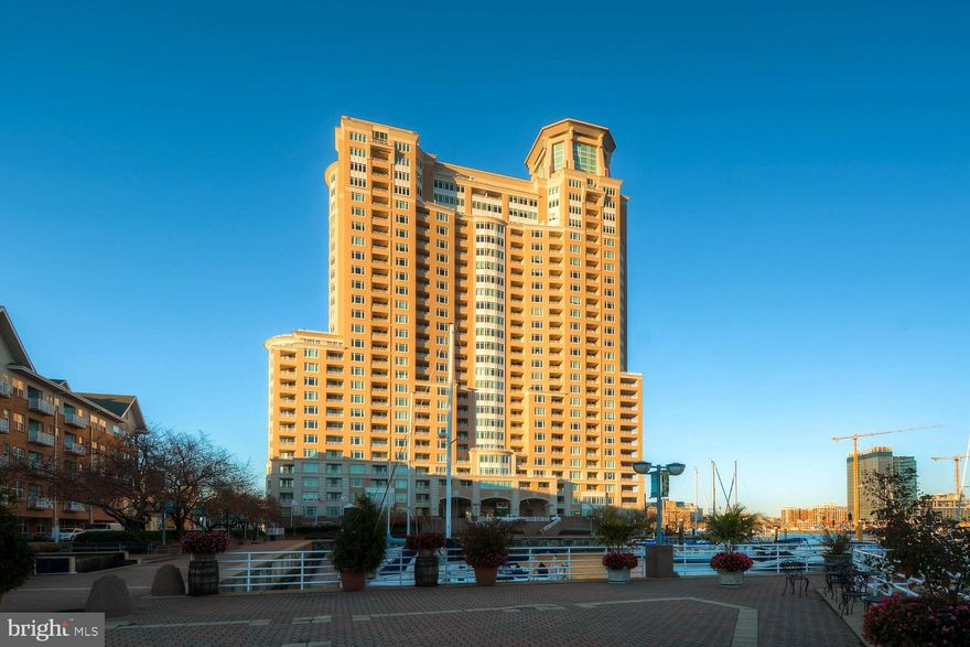 TWO FULL BEDROOMS, TWO FULL BATHROOMS, DIRECT EAST & SOUTHERN EXPOSURE OVER LOOKING THE BALTIMORE HARBOR, MARINA CENTER & DOMINO SUGAR! HUGE OPEN KITCHEN W/ BREAKFAST AREA. GRANITE KITCHEN, S/S APPLIANCES, CERAMIC TILED FLOORS, WOOD FLOORING IN THE LIVING SPACE, LARGE WALK-IN CLOSET, CORNER BALCONY!  TWO  FULL SIZE PARKING SPACES.