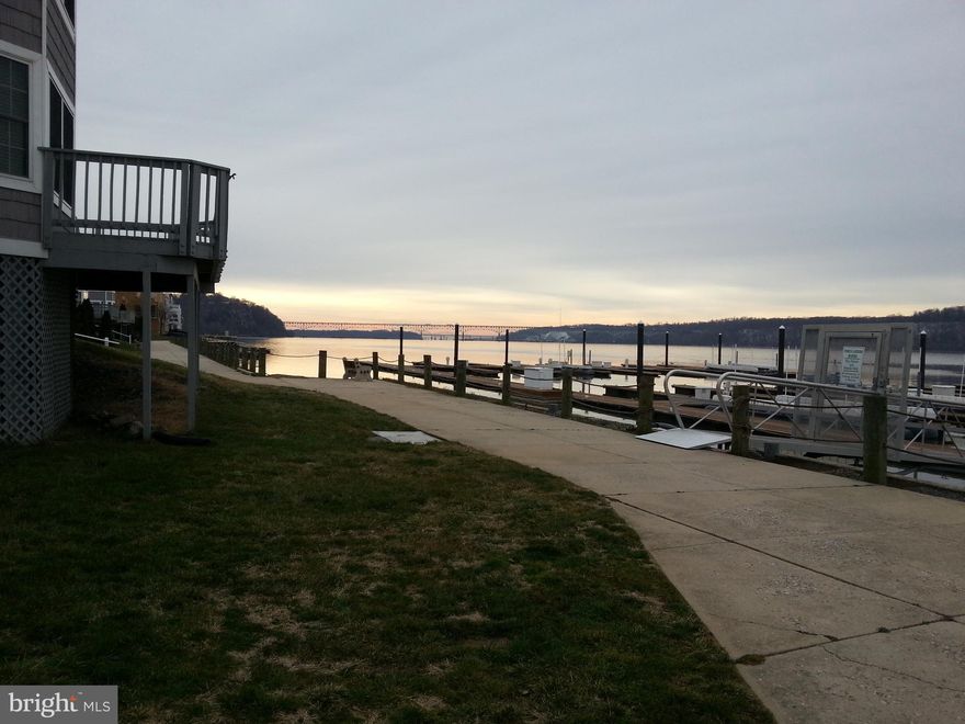 Spacious 2 bedroom, 2 full bath condo with water views and close to marinas. Small breakfast bar in kitchen. This condo features large rooms, master walk-in closet and washer/dryer. Balcony on main floor and 1 car garage with storage. Minutes from I-95 and Harford County.