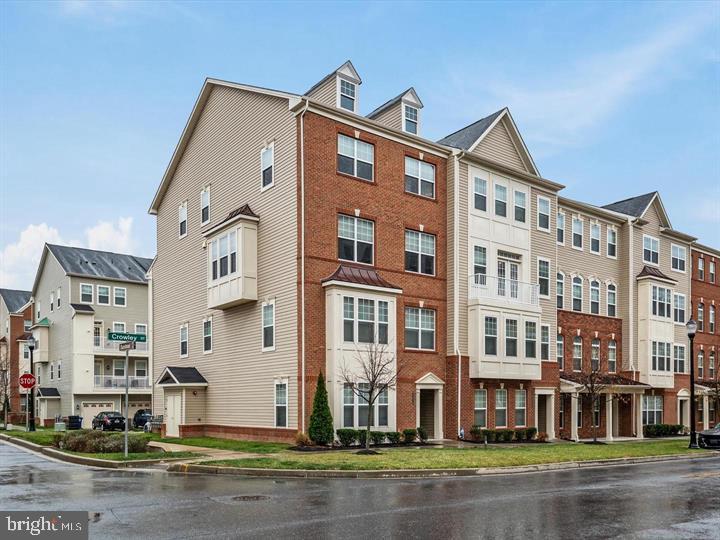 Luxury Elevator Townhome for Rent – 3BR/2.5BA – Resort-Style Living in Prime Howard County Location! Live in style and comfort in this stunning 3-level brick-end townhome with private elevator and over $43,000 in high-end upgrades. Featuring: Gourmet kitchen with quartz countertops, 5-burner gas stove, wall oven, built-in microwave, pantry & custom backsplash. Spacious open-concept main floor with hardwoods, tall windows, 9-ft ceilings, and custom lighting. Private deck, cozy living area, and built-in bar – perfect for entertaining. Elevator access to all levels – ideal for mobility ease. Primary suite with tray ceiling, walk-in closet, spa-like bath with soaking tub, walk-in shower & dual sinks. Convenient upstairs laundry with washer/dryer. Smart home features: WiFi-certified, SmartThings hub, Ring doorbell, Echo Dot, smart thermostat, and more. 2-car garage with epoxy floor and built-in storage. Enjoy maintenance-free living – condo covers all exterior care. Walk to the pool, clubhouse, gym, playground, coffee shop & top-rated schools. 📍Just minutes to Fort Meade/NSA. HOA + Condo Fees $270/month. 🏡 Available now – schedule your private tour today!