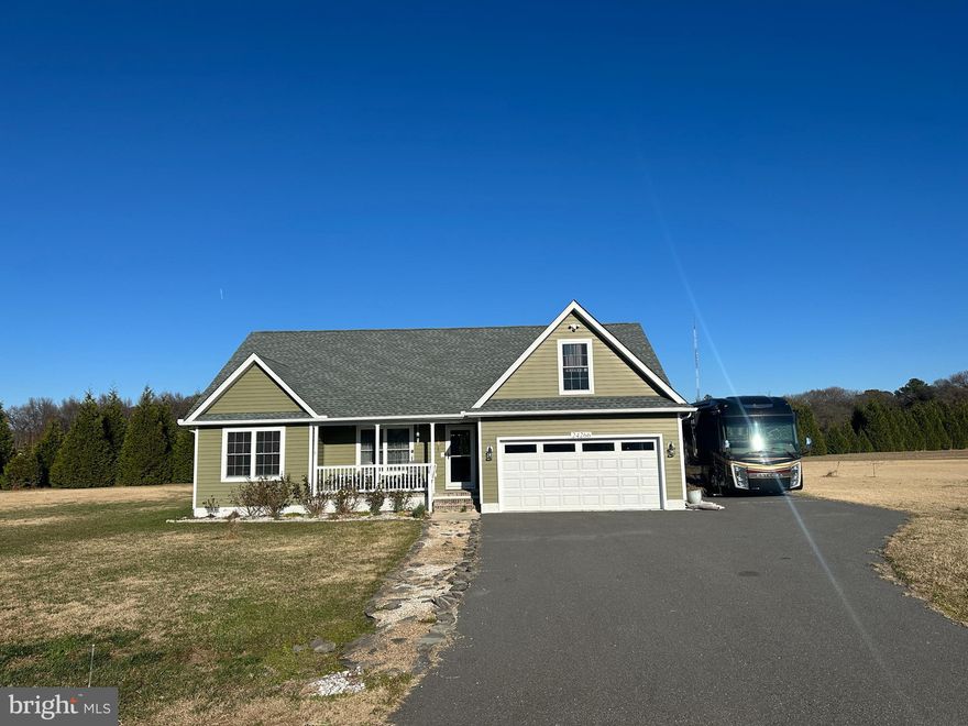 This property is located just minutes from the Nanticoke River Marina in Blades, with navigable access to the Maryland Chesapeake Bay. The marina offers a public boat ramp as well as boat slip rentals.
The 3-bedroom, 2-bath rancher offers the perfect blend of comfort and functionality, it's open floorplan is enhanced by trayed ceilings providing a spacious and airy feel along with ceiling fans throughout the home.  Enjoy the abundant natural light in the spacious sunroom,  which provides an ideal space to relax year-round, or unwind in the screened-in porch, which provides an ideal space to relax or host gatherings. While the inviting front porch and rear patio add even more outdoor living options.
Primary suite features a walk-in closet and a private bath with a tile shower and double vanity. The hall bath includes a fiberglass tub/shower combo and single vanity. Stylish vinyl plank flooring flows throughout the home, and a separate laundry room adds everyday convenience.
The kitchen is equipped with a gas stove/range and built-in pantry. 
The extended paved driveway runs alongside the 2 car attached garage providing extra convenience for guest parking or camper/boat parking. There's also a storage shed for lawn tools or hobbies. Crawl space is encapsulated and dehumidifier installed. Class H Septic Inspection has been completed and is Satisfactory.