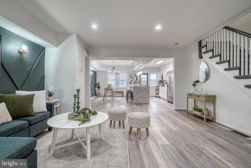 Welcome to the newly renovated 719 N Augusta Ave, located in the Endmonson Village neighborhood. When you enter this home, you will notice the modern paneled accent wall and the open feel. Enjoy lots of natural light, as well as recessed lighting and modern fixtures throughout. You will relish cooking in the gourmet kitchen, featuring a large island with a quartz waterfall, stainless steel appliances, and a beautiful backsplash. Right off the kitchen is a large deck, perfect for entertaining.
Upstairs, there are three carpeted bedrooms and a luxurious full bathroom. The basement is finished with a rec room, bedroom/office, and a full bathroom. Additionally, there is a rear entry attached garage for added convenience.