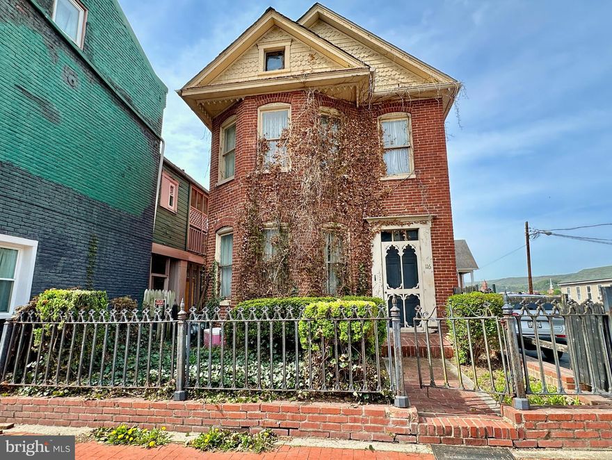 VICTORIAN FIXER UPPER IN HEART OF DOWNTOWN CUMBERLAND! Welcome to 116 Decatur Street. This circa 1904 home is a diamond in the rough with 3 bedrooms and 2 full bathrooms. With a little TLC, this property has the potential to be a single-family home or a two-unit investment property. The main floor features a foyer, open concept living room and formal dining room, an eat-in kitchen, a den, a bedroom and full bathroom. Upstairs, there is a bedroom, a potential 3/4 bedrooms (or a living room if made into a separate apartment), a small kitchen and a full bathroom. There is a walk-up attic and an unfinished basement with potential for another finished room. Outside, there is a deck and a brick courtyard. With some work, this home could really shine again! Walking distance to Baltimore Street and shopping. Convenient to I-68. SOLD IN AS IS CONDITION.