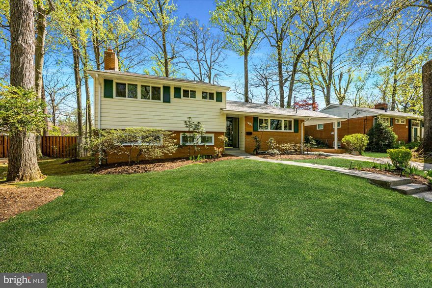 Pristine 3 bedroom (plus den), 3 full bathroom home in coveted Wildwood Manor. Completely renovated, including new roof, windows, HVAC, water heater, kitchen, primary bathroom, refinished wood floors and freshly painted through-out. This inviting property features a sun-filled living room open to the gourmet kitchen and perfectly situated dining room. The large family room has a fireplace and steps out to the extraordinary level backyard with patio. The den can be used as a guest suite or home office. Upstairs features the primary suite with updated bathroom, as well as two large, bright bedrooms and a full hall bathroom. Oversized lower level storage, private driveway and carport. Walk to all Wildwood Shopping Center has to offer including restaurants, grocers, cafes and retail shopping. Grovesnor Metro less than 1 miles away, easy commuter access to both 495 and 270, plus Bethesda Trolley Trail, many local parks, YMCA, and Montgomery Mall. Walter Johnson Cluster.