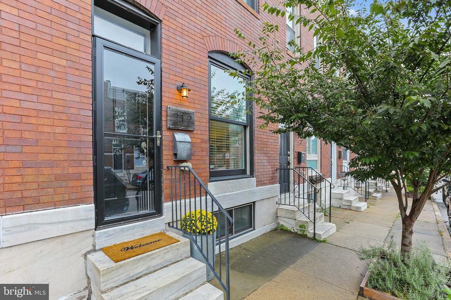 Cheaper than renting and steps away from Patterson Park! 4 years (+/-) of CHAP tax credit left, saving you nearly $4,000 in property taxes each year. (Most recent annual tax bill was $3,092.02.) Fully renovated in 2015/2016, this 3 bed, 3 bath home comes with a parking pad and rooftop deck with a pergola, sunshades & views of Patterson Park. 

The open concept main level greets you with taupe hardwood floors, coffered ceilings, exposed brick and plenty of natural light from the large front window. Custom trim work & wainscoting along the living and dining areas. Designated dining area. Gourmet kitchen with a large island, upgraded quartz counter tops, SS appliances, and ample cabinet space for storage. 2 beds and 2 baths upstairs. Primary suite in the front with tray ceilings, and ensuite bath with walk-in shower. Hall bath and second bedroom in rear of the home with access to dual-level rooftop deck. Rooftop deck has recently been stained and also upgraded with TREX railings, pergola, retractable sunshades (above) and a pull down front sunshade to keep you cool during the hot Summer months. 3rd bedroom and bathroom in the basement. Full size side-by-side laundry. Ample storage space. Conveniently located steps from Patterson Park (less than a block) and a short walk to all the restaurants and bars that Canton, Patterson Park & Highlandtown have to offer. Priced to sell, don't miss out!