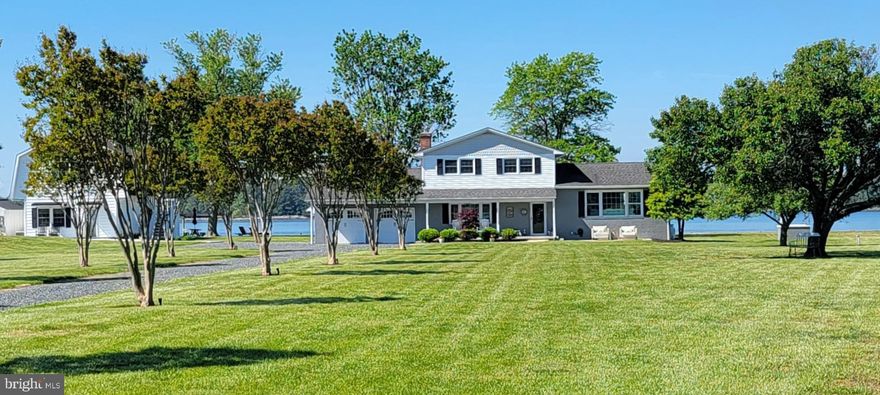 Enjoy waterfront living at its finest in this 3 bedroom 2 1/2 bath home! Complete with a fully finished detached structure!  
Enjoy the pristine and sprawling landscape as you drive along the lane to reach this private, lovingly cared for, quintessential Eastern Shore property!
As you step into the welcoming foyer of this fully renovated home, you’ll find
a first level open floor plan featuring luxury vinyl plank flooring throughout!
Relax in your living/dining space which allows for sweeping views from large picture windows of both the farmland and the sparkling Choptank River.
Prepare delicious meals in your spacious kitchen, complete with luxury quartz countertops, Fridgedair brand stainless kitchen appliances and designer kitchen island!
From here, step through sliding French doors onto your deck for morning coffee and gorgeous sunsets!
The first level also offers a spacious family room with a wood burning fireplace, and a sunroom/exercise room with vaulted ceiling, large windows and patio doors that lead to a lower deck for more relaxing while enjoying beautiful views of the yard and water.
*the second level of this home offers newly carpeted rooms; a large master bedroom with en suite bath and 2 additional bedrooms and hall bath.
This property is truly magical! Enjoy sunny days and gorgeous sunsets from a bench under a tree, or lounge chairs in the yard. Watch the Osprey build their yearly nest and raise their chicks or marvel at the starry night sky from the Adirondack chairs on the waterside party deck!
The waterfront view isnt the only star of this amazing property! The front porch rocking chairs are perfect for relaxing in a peaceful shady spot with views of the surrounding farmland and abundant birds and wildlife!

This home not only provides ample living and recreational space for you to enjoy peaceful day to day living, but also truly provides the space and opportunity to create lasting memories with family and friends surrounded by all the natural beauty the Eastern shore has to offer!