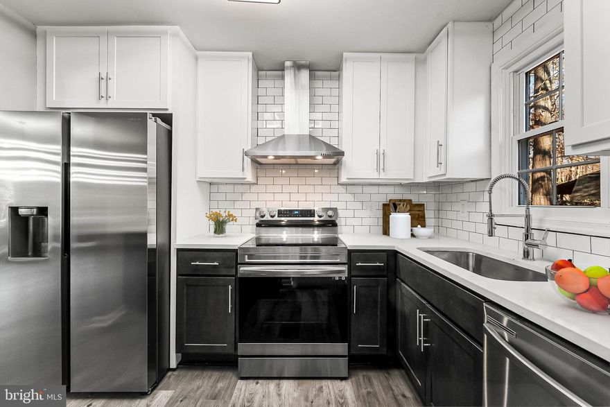 Priced To Sell Fast! Hot Renovated Brick Rambler with Large 1 Car Garage, Spacious Kitchen with QUARTZ Counters, Stainless Steel Appliances, New Cabinets, Modern Tile Backsplash, Spacious Bedrooms, New Custom Paint, Updated Bathrooms, New Flooring, New Lighting, Fireplace, Deck, Fenced Backyard, Storage Sheds, Much More!! Close to Schools, Shopping, and Commuter Routes.  This Will Not Last!