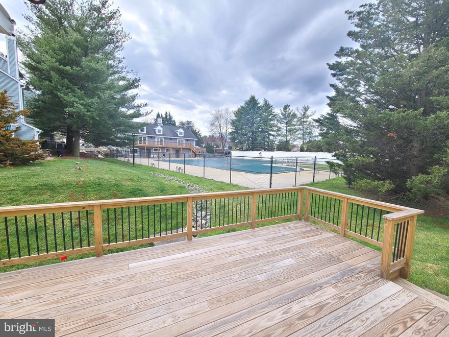 Charming Th with new pergo wood floors, new carpet, fresh paint, large deck off living room, large bedrooms, updated bathrooms, large top level master suite with walk in closet. Walk to shopping, restaurants, community pool & public transportation.** We have an in-house Maint Dept for QUICK repair response/ 24 hrs emergency.  * AGENTS read the Agent Private remarks please !!!