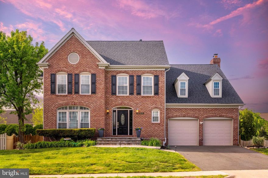 Offers received. Offer deadline is 12 o'clock noon on Monday, April 28th. Welcome to 2636 Meadow Hall Drive – a stunning brick front colonial in Herndon’s sought-after Meadow Hall neighborhood. This spacious three-level colonial offers over 4,600 sq. ft. of finished living space, featuring a welcoming two-story foyer and gleaming hardwood floors throughout. The updated kitchen is a true standout, with custom cabinetry, brand-new quartz countertops, a custom tile backsplash, a new cooktop, dishwasher, stainless steel appliances, recessed lighting, and ample storage space. The main level also includes a formal living room and dining room, a bright and airy home office, an updated powder room, and a large laundry room with a brand new washer and dryer. The inviting family room, complete with a gas fireplace, opens to a screened-in porch and deck, perfect for entertaining, with a fully fenced yard and hardscape patio featuring a fire pit. On the upper level, you’ll find three generously sized guest bedrooms, an updated hall bath, and a spacious owner’s suite with two walk-in closets, a cozy fireplace, and a beautifully renovated en suite bathroom. The walk-up lower level features a massive recreation room, a full bath, a wet bar with a wine fridge, and an abundance of storage space in the mechanical room. Recent upgrades include a new roof (2022), a new hot water heater (2021), a renovated kitchen (2024), newer siding (2016), and fully renovated bathrooms (2022/2023). Additionally, there’s a brand-new washer and dryer (2025), fresh paint throughout (2025), and a new front walkway with exterior lighting and landscaping (2023). The upper bedroom carpets were replaced in 2021. This home is located within the highly rated Fairfax County School District, zoned for Floris Elementary, Carson Middle, and South Lakes High School. It’s also conveniently located near Dulles International Airport, metro and bus stops, and major commuter routes including Fairfax County Parkway, the toll road, and Route 28. The vibrant Herndon community offers a wide variety of events, including the farmers market, fireworks, and the popular ‘Friday Night Live’ summer concert series. This home offers the perfect blend of privacy and accessibility.