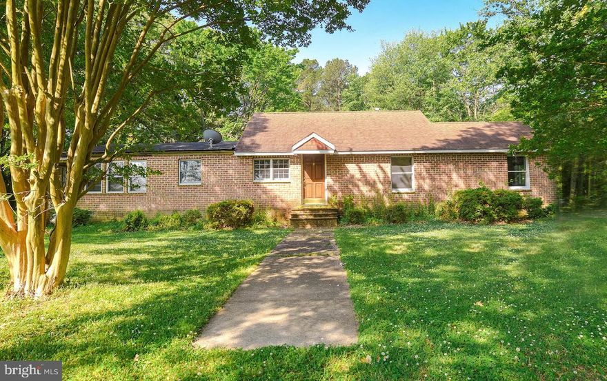 Looking for a project, here it is!! Wonderful location on 1.7 acre flat lot.  New roof in 2007.  22x22 detached garage with pull down attic storage.  Could easily be made into a 3 bedroom.  All on one floor , no steps. Circular paved driveway and public sewer.  Some floors r hardwood and tile.  HOME IS BEING SOLD AS IS.