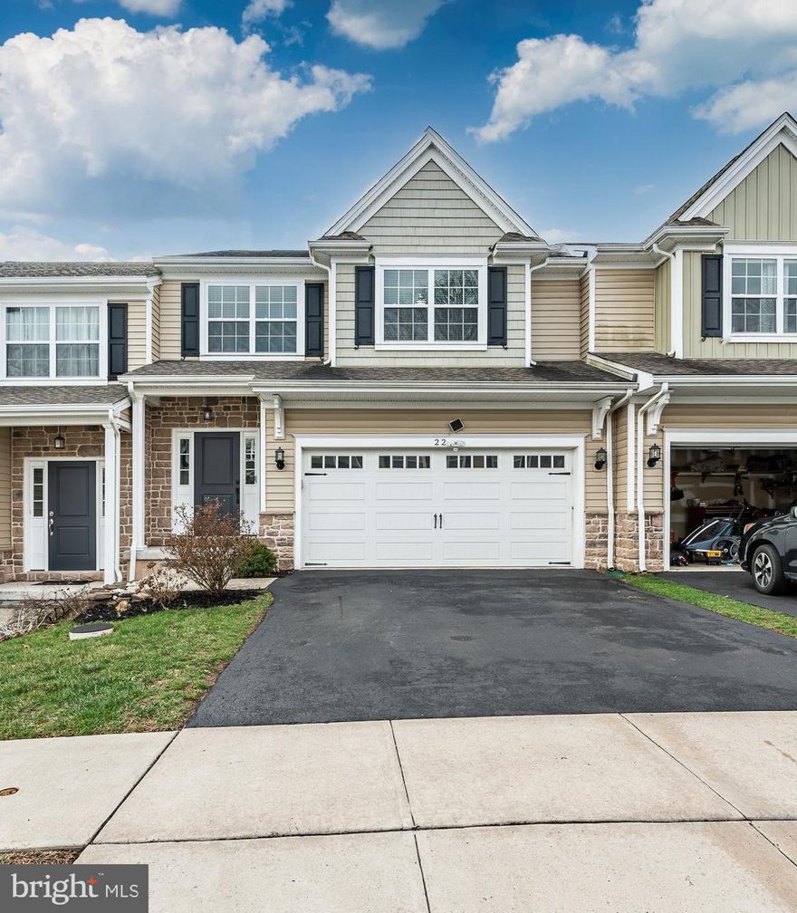 Looking for a luxury 3-bedroom, 2.5-bathroom carriage home with a 2-car garage? Look no further than Glenwood Reserve, an exclusive, quiet community of just 14 homes tucked away in the heart of Historic Collegeville Borough. Located within walking distance of the Perkiomen Trail, this charming neighborhood offers both tranquility and convenience.

Step inside this beautiful home featuring 9-foot ceilings on the main level, creating a spacious and airy atmosphere. The formal dining room, adorned with crown molding and chair railing, sets the tone for elegant living. The living room provides a cozy, welcoming space, and the expansive family room, complete with a fireplace, is perfect for relaxing or entertaining. 

The gourmet kitchen is a chef's dream, featuring granite countertops, a stylish tile backsplash, a stovetop, double ovens, and a microwave. A large breakfast room with a sliding door and transom window opens to a low-maintenance Trex deck—ideal for outdoor enjoyment.

Upstairs, you'll find a versatile loft that could be the perfect study or home office. The massive master bedroom boasts two walk-in closets, while the luxurious master bath offers double sinks, a frameless shower, and a soaking tub. All bathrooms feature elegant tile finishes. Two additional generously-sized bedrooms complete the second floor, along with a laundry room that includes a washer, dryer, and a large linen closet. Ceiling fans are installed throughout the bedrooms and loft for added comfort.

The unfinished basement, with 9-foot ceilings, runs the full length of the home . It also provides a walkout to a patio with a garden bed, offering even more space for customization.

This home also includes a 2-car garage and dedicated extra parking spaces exclusively for the community residents. Don’t miss out on the opportunity to live in this stunning home in a sought-after location!