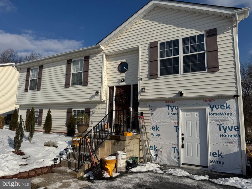 This is a two-bedroom, one full-bath apartment featuring two living areas, a full kitchen, and a laundry room with its washer and dryer on the lower level of a split foyer home, located off Route 51 between Inwood and Bunker Hill, with shared driveway parking for up to two cars in WV. It is in a great location in the South Berkeley area with easy access to Route 11 and I-81. All utilities are included. 
A rental application is required for each adult over the age of 18. Prior rental payment history, employment verification, a credit check, and a criminal background check will be conducted. The combined income of one or two earners must equal three times the rent amount, with good job history and a one-year lease. Available for immediate move-in, one month's deposit upon rental application approval is required, along with the first month's rent before move-in. No pets are allowed. Cable only; no satellite dish and no subletting. Mowing, snow removal, and parking are shared. Ready for immediate occupation.