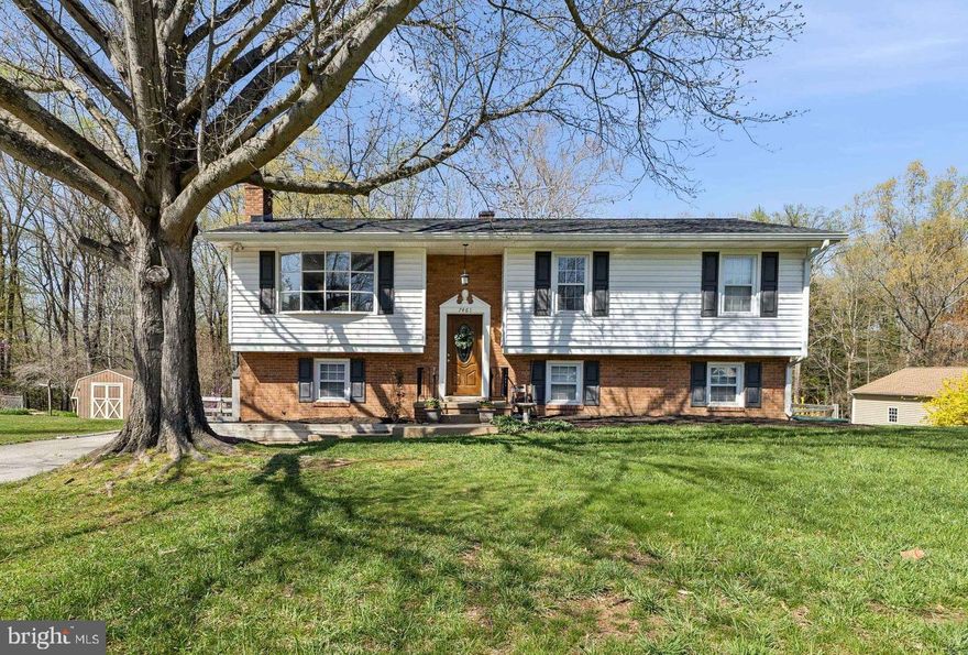 Beautifully updated 4-bedroom, 3-bath home just outside the town limits of La Plata! The main level features an open-concept kitchen, dining, and living area with a spacious kitchen island, farmhouse sink, stainless steel appliances, and sleek granite countertops. A large bay window in the living room fills the space with natural light and offers a beautiful view of the front yard. Down the hall, you’ll find the primary bedroom with an en-suite bathroom and huge walk-in closet, a second bedroom, and a full hallway bath.

The lower level boasts a generous rec room with a brick wood-burning fireplace, custom built-in cabinets and shelving, plus a bar area with two wine fridges, perfect for entertaining. This level also includes two additional bedrooms, a third full bathroom, and a large laundry room. Step outside to enjoy the composite deck off the kitchen, leading down to a lower-level deck and patio within the fenced backyard. A storage shed provides extra convenience. Located in a quiet, peaceful neighborhood with no HOA, yet close to everything.

Major updates include a full renovation in 2017 with new flooring, plumbing, stainless steel kitchen appliances, and fully renovated bathrooms and kitchen. A new roof, gutters, and shutters were added in May 2022, Trex deck boards in April 2024, and fresh paint with new carpet in March 2025. This home has been meticulously maintained and is ready for its next owner. Schedule your showing today!