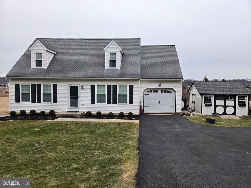 Welcome to 815 Chestnut Hill Rd in the desirable Parkesburg Borough. This home is well maintained and overlooks beautiful farm country. As you walk through the front door you are welcomed by the laminate hardwood floors and cathedral ceiling in the warm living room, perfect for entertaining.  As you continue in, the kitchen boasts of lots of cabinets, a large island, updated stainless steel appliances and granite countertops with an attached eat-in kitchen area. The primary bedroom is on the main floor along with an updated ensuite with new flooring and cabinetry. The primary bedroom is complete with ceiling fan, laminate hardwood flooring and a walk in closest.  Ascend to the second floor and you will see the large 2 bedrooms complete with oversized closets and a hall bathroom. The finished walkout basement, half bathroom and unfinished storage areas are perfect for entertaining and tons of storage. The laundry area completes the basement.  As you walk out the sliding glass door in the kitchen you will step onto to a quiet composite newly updated deck overlooking beautiful farmland. There is a shed for additional storage. The yard is partially fenced as well. This home is conveniently located near major roadways and shopping.

Additional features: New windows (2025), enlarged composite deck (2025), expanded driveway (2025), new garage door (2025), new landscaping (2025), and laminate hardwood flooring on two levels.