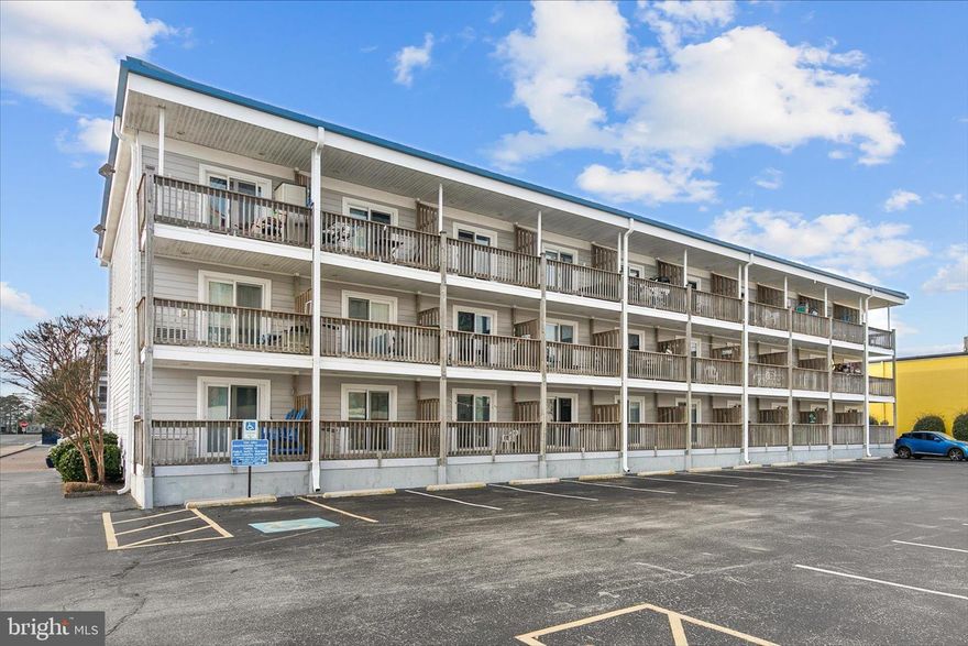 Welcome to New Orleans Court, a charming coastal sanctuary nestled in the heart of North Ocean City. This inviting third floor condo is easily accessed by a community elevator and is surrounded by beautifully maintained amenities, including a peaceful courtyard and a sparkling inground swimming pool with a kids splash pool. Thoughtfully updated and sold fully furnished, this residence offers a true move-in-ready opportunity to begin enjoying the beach lifestyle right away.

Inside, the condo showcases a clean, coastal aesthetic with a light and airy color palette that instantly feels relaxed and welcoming. An open and flowing floor plan connects the kitchen, dining, and living areas, a desirable enhancement not found in many units within the community. Laminate plank flooring runs throughout, and the home has been fully drywalled, adding to its polished, finished feel. Ocean breezes easily drift through the unit  thanks to both a sliding screened front door and a rear sliding glass door, creating a naturally refreshed indoor environment.

The updated kitchen is both stylish and functional, featuring quartz countertops, crisp white soft-close cabinetry, modern white appliances, a refrigerator with ice maker, dishwasher, garbage disposal, and a recessed sink with sprayer faucet. A contemporary tiled backsplash adds a touch of coastal sophistication, making this kitchen ideal for both everyday living and entertaining.

The spacious primary bedroom is furnished in calming whites and serves as a serene retreat after a day at the beach. Sliding doors lead directly to the east-facing balcony, perfect for welcoming the morning sun or unwinding in the evening. The full bathroom offers an oversized walk-in shower and its own baseboard heat, ensuring comfort year-round. Additional storage includes a hallway linen closet and a convenient coat closet, while updated doors throughout the unit further enhance its turnkey appeal.

Ideally located in North Ocean City, this condo places you close to local amusements, popular restaurants, shopping, and the vibrant activities at Northside Park. Whether you are searching for a low-maintenance coastal home, a relaxing beach retreat, or a smart investment, this beautifully updated condo offers charm, comfort, and convenience in one of Ocean City’s most desirable locations.