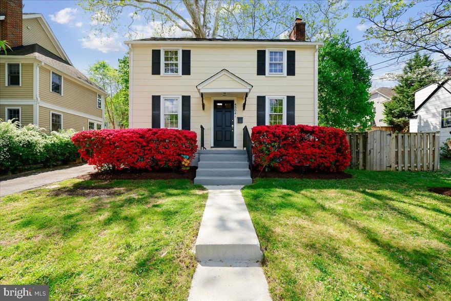 Nestled on a tranquil street in Glenbrook Village, this charming Colonial offers classic character and modern refinement. The home welcomes you with a freshly painted interior and newly finished hardwood floors throughout the main and upper levels. At the heart of the main floor, a cozy living room anchored by a traditional brick fireplace provides an inviting retreat. The kitchen features updated countertops and stainless steel appliances with a convenient eat-in counter that opens directly to the dining room, creating a seamless flow for hosting and daily living.

The upper level is home to two well-sized bedrooms, each filled with natural light and maintaining the home's polished aesthetic. Below, the versatile lower level has been refreshed with brand-new luxury vinyl plank flooring and includes a full bathroom, offering the flexibility to serve as a spacious recreation room or an additional bedroom suite.

This location is truly unbeatable, just blocks from Walter Reed, NIH, and the Metro, with the scenic trails of Rock Creek Park and the premier dining and shopping of downtown Bethesda only minutes away.